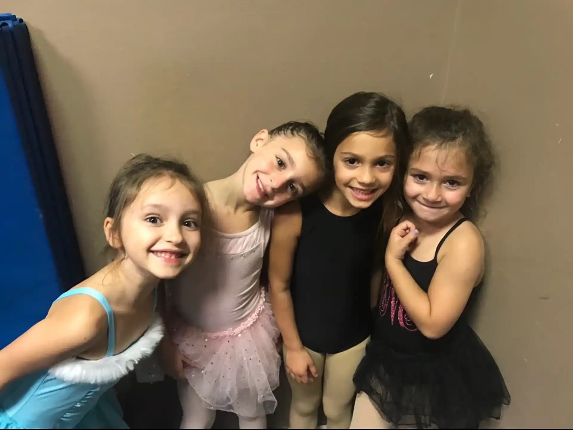 a group of children posing for a photo