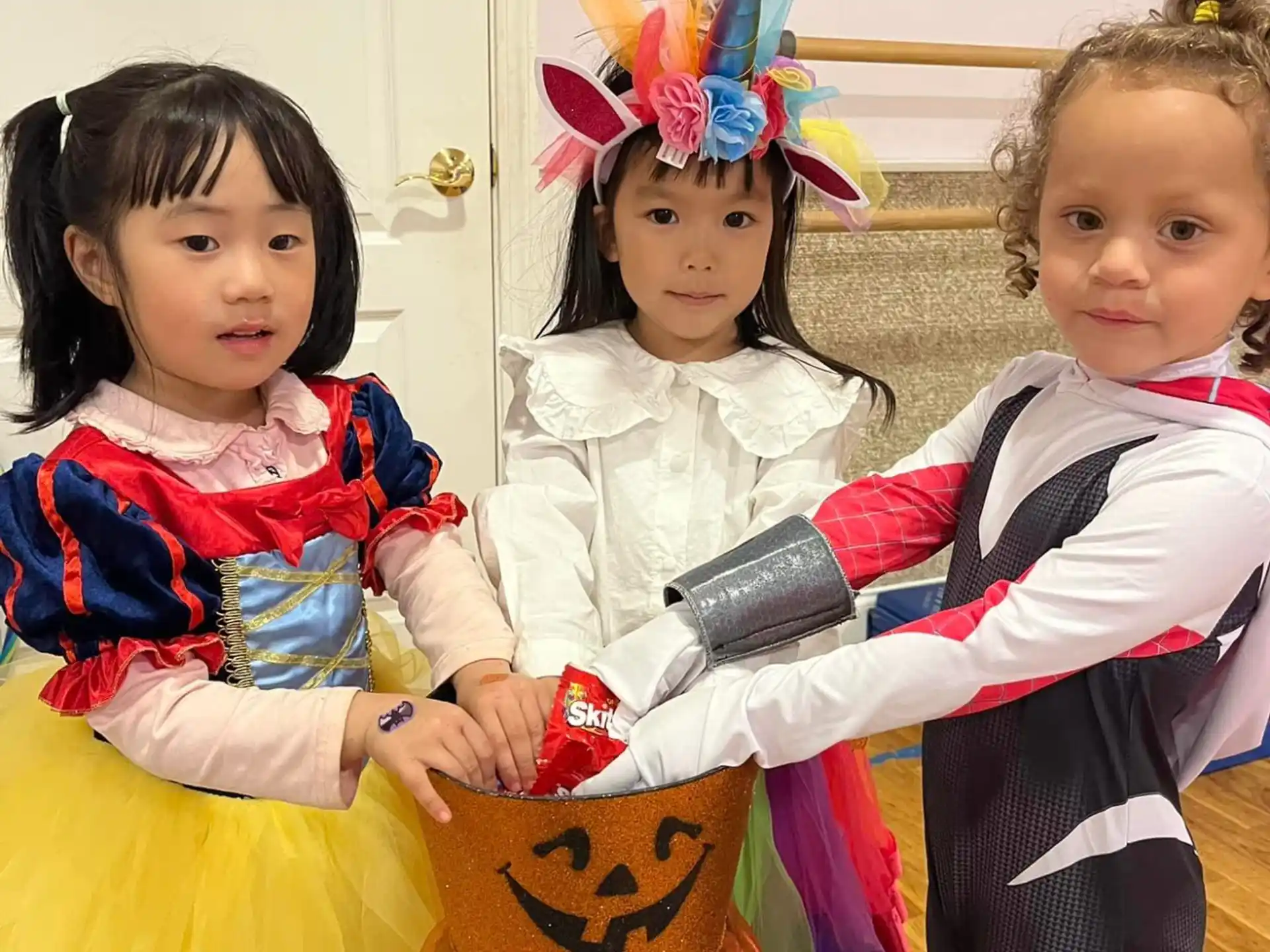 a group of children in clothing