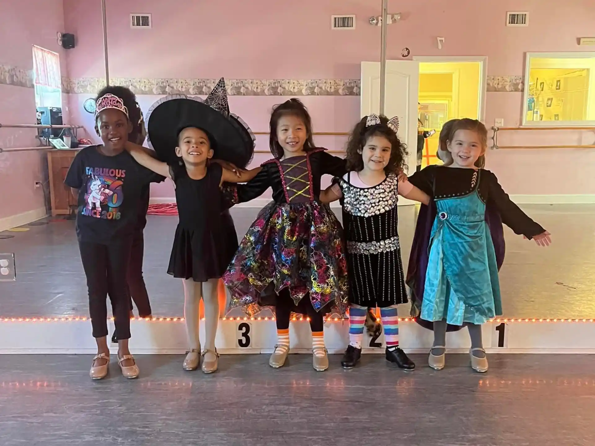 a group of girls in clothing