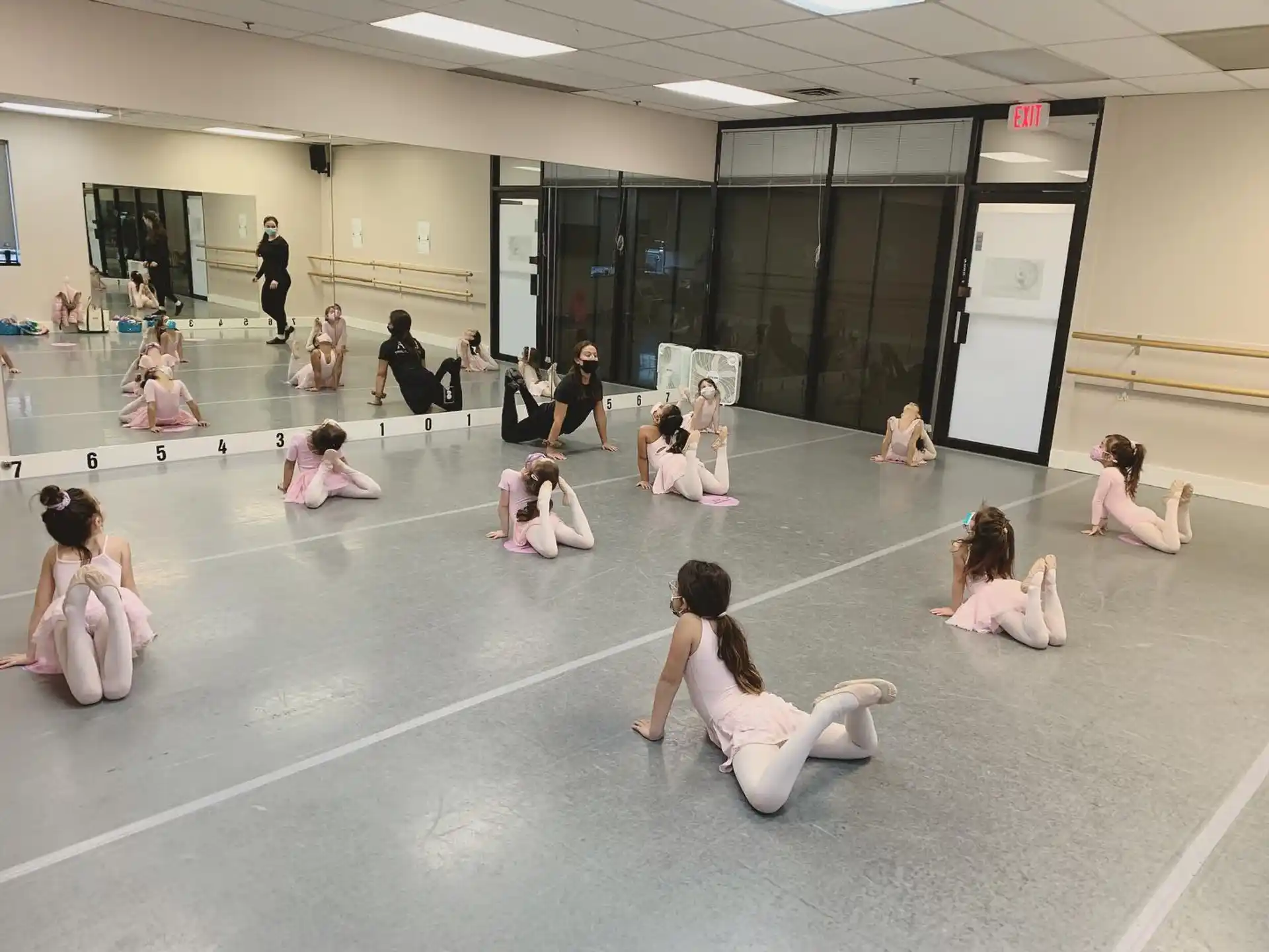 a group of people sitting on the floor