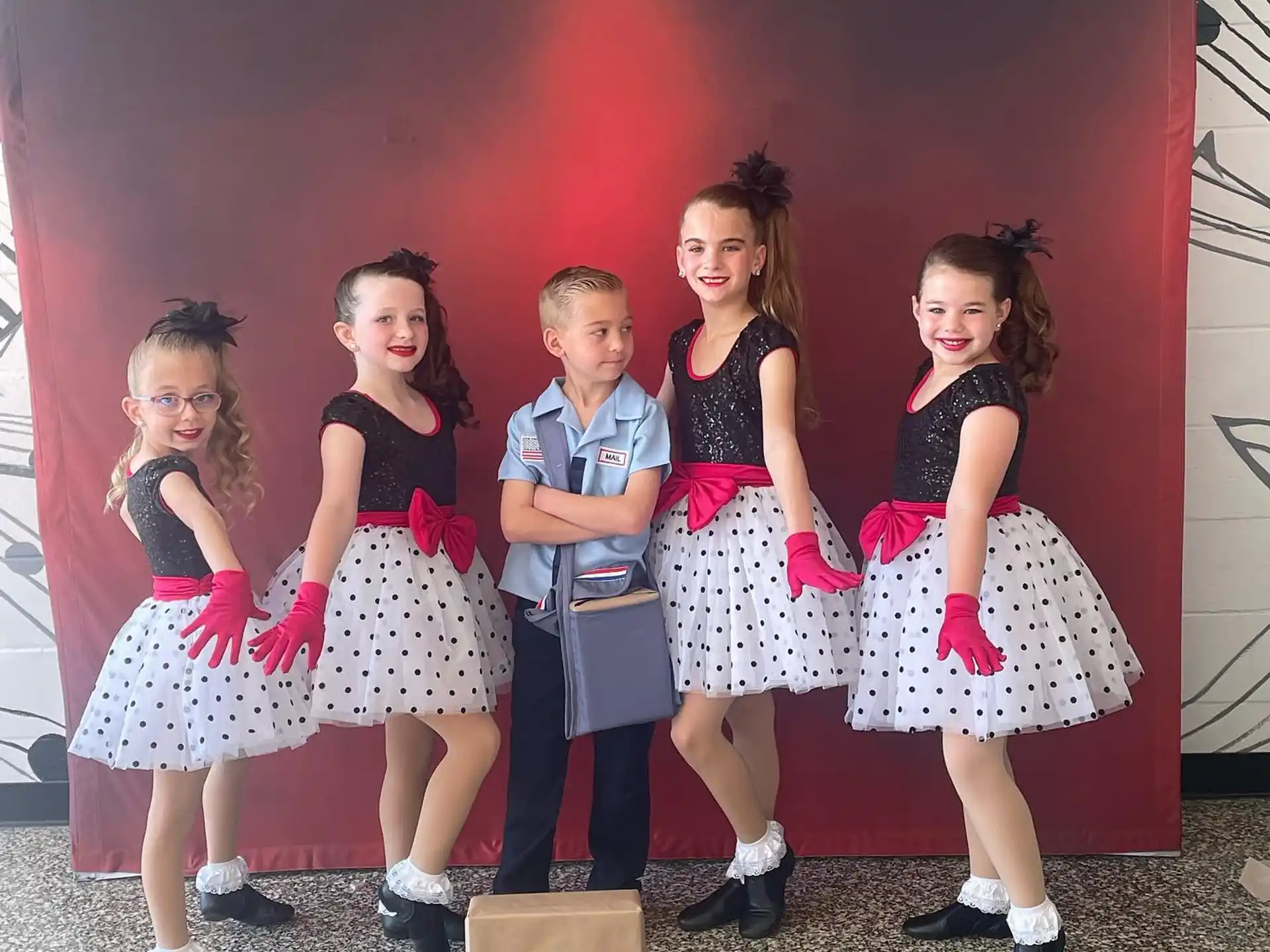 a group of girls posing for a picture