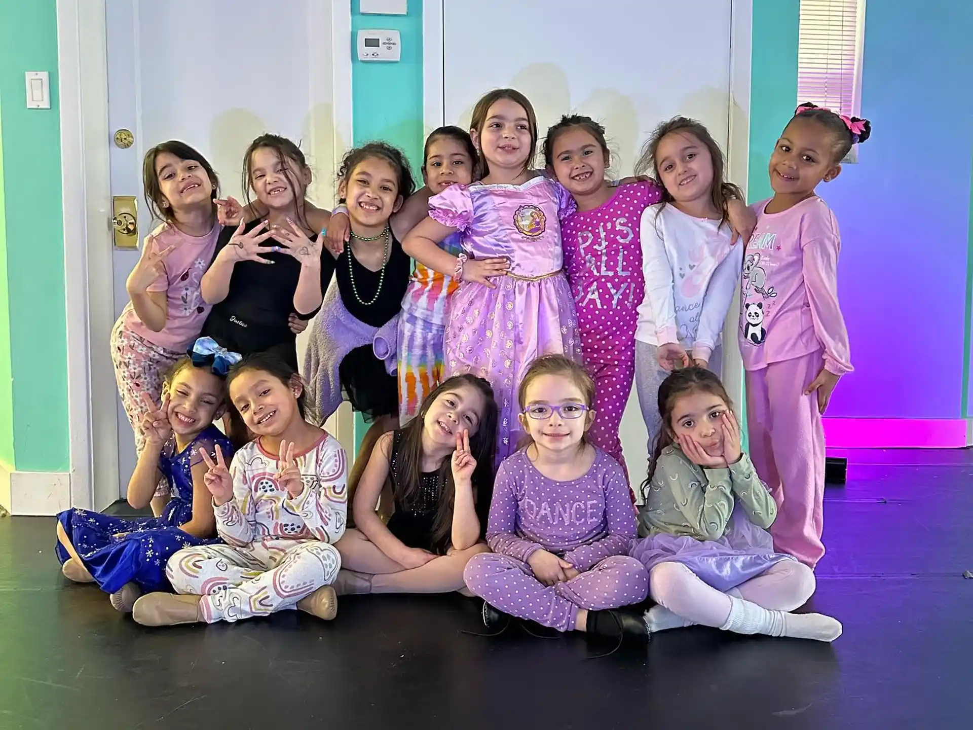 a group of children posing for a photo