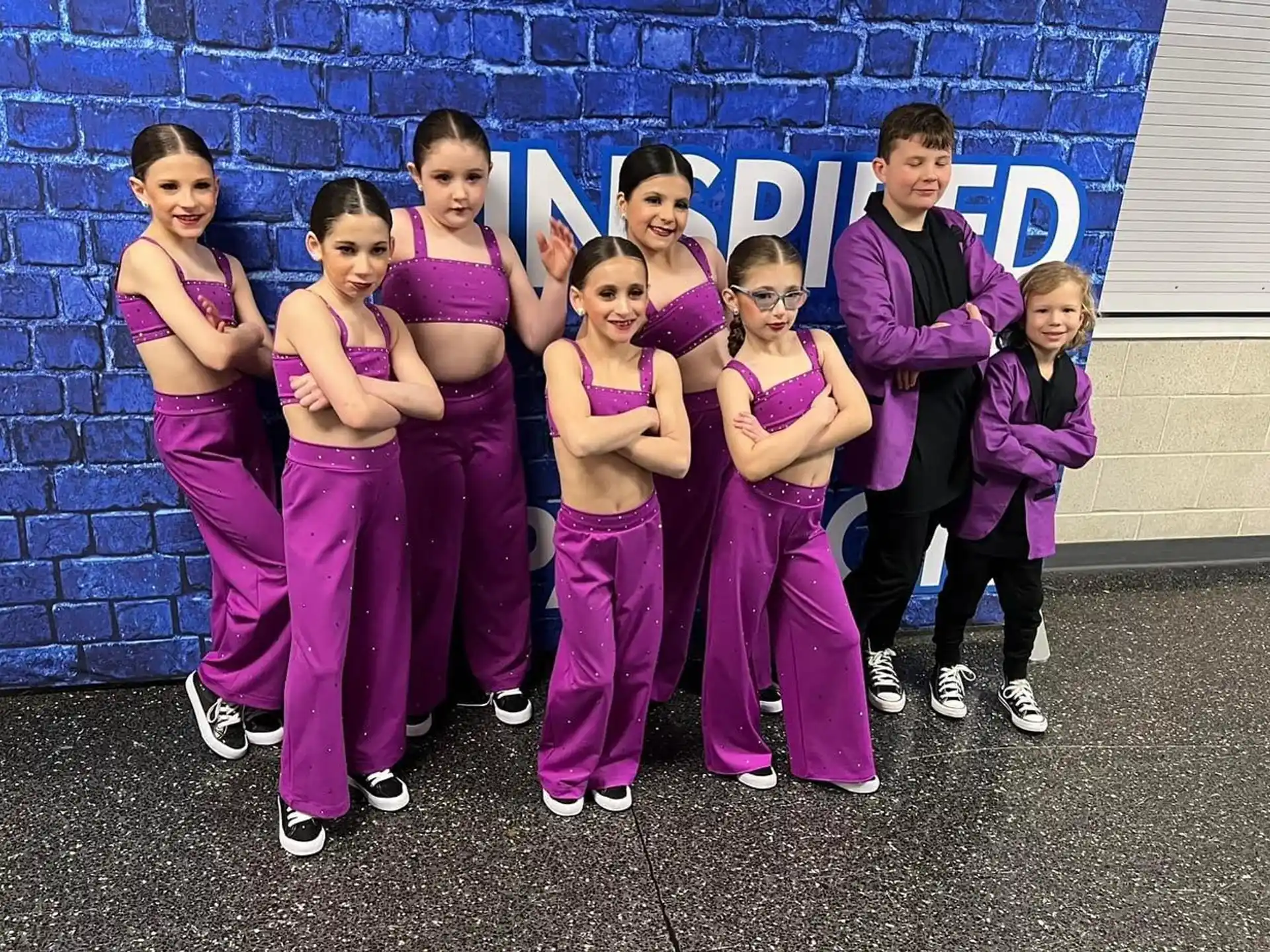 a group of people posing for the camera