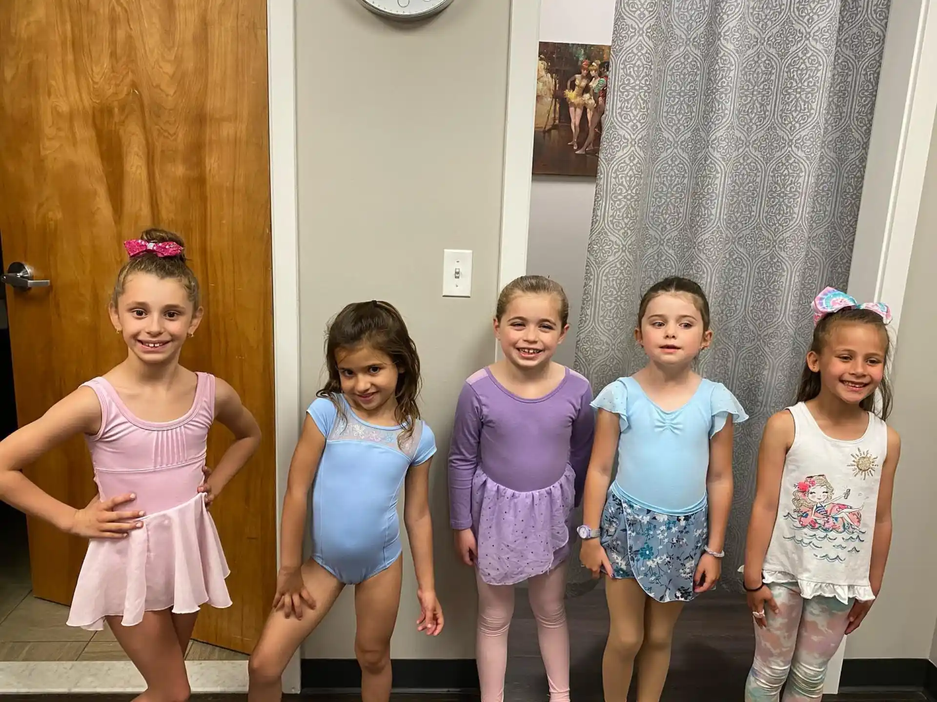 a group of girls posing for a picture