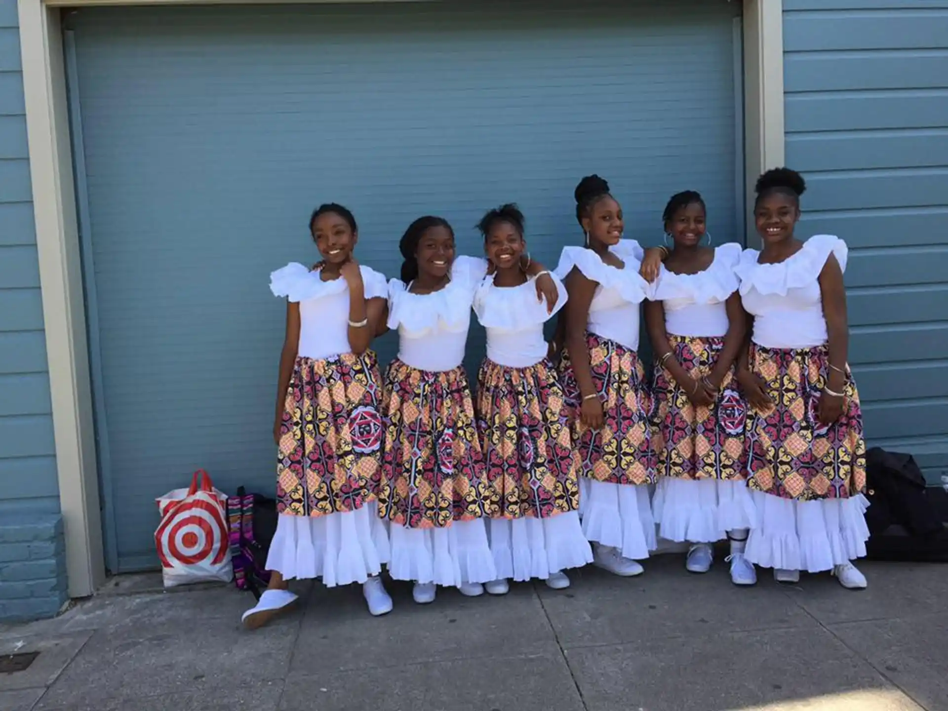 a group of women posing for a photo