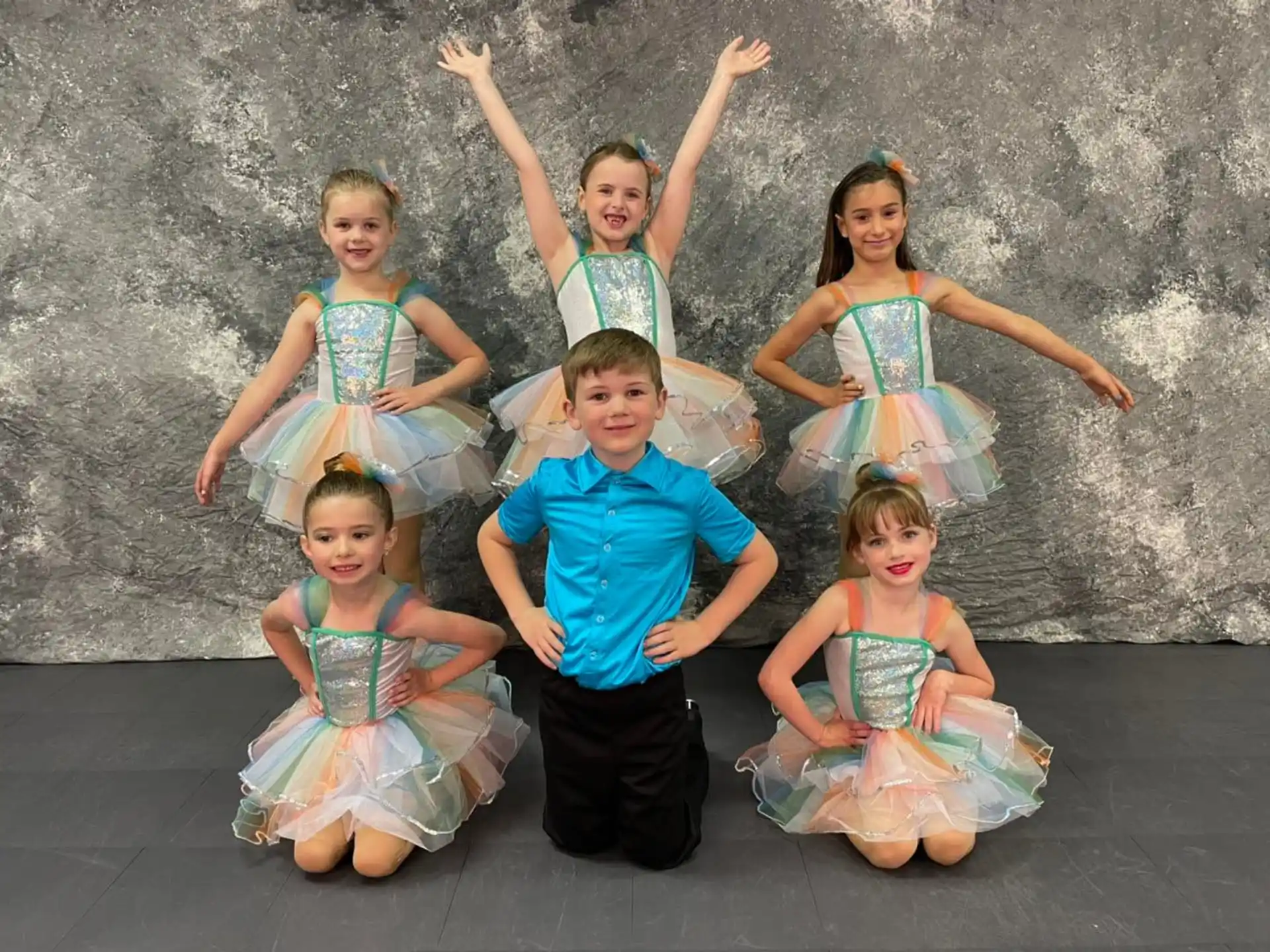 a group of children posing for a photo