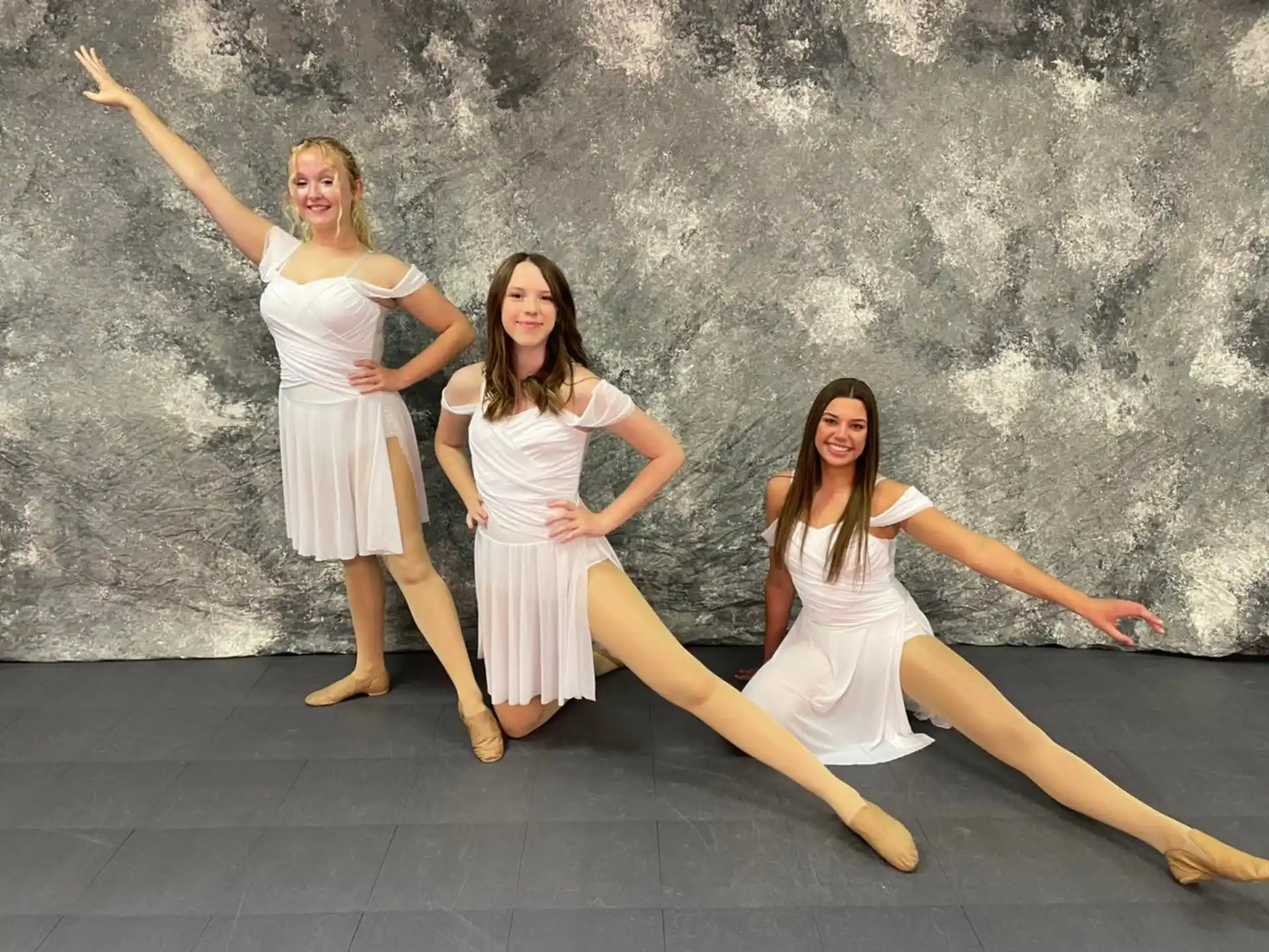 a group of women posing for a picture