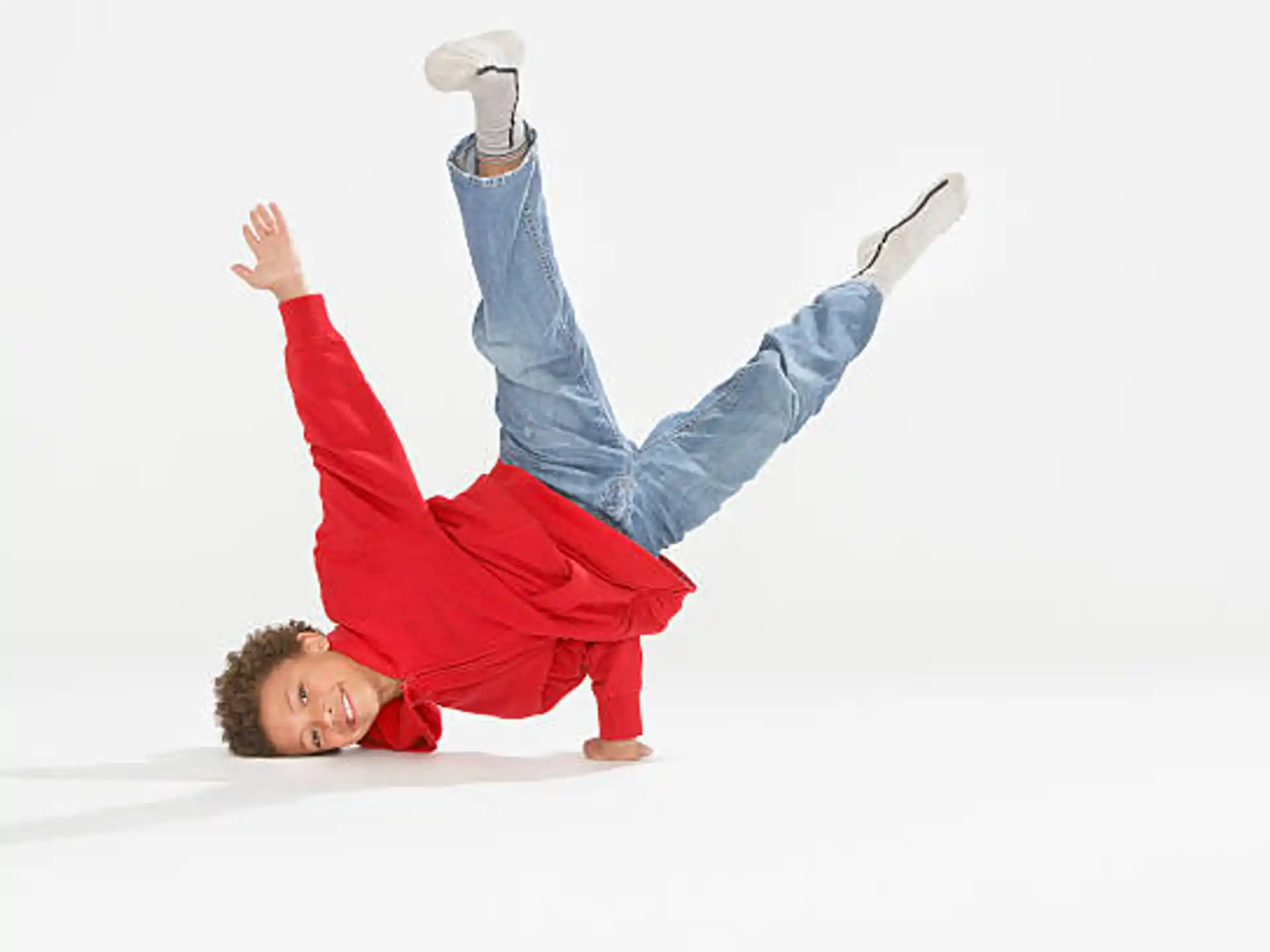 a boy in a red suit