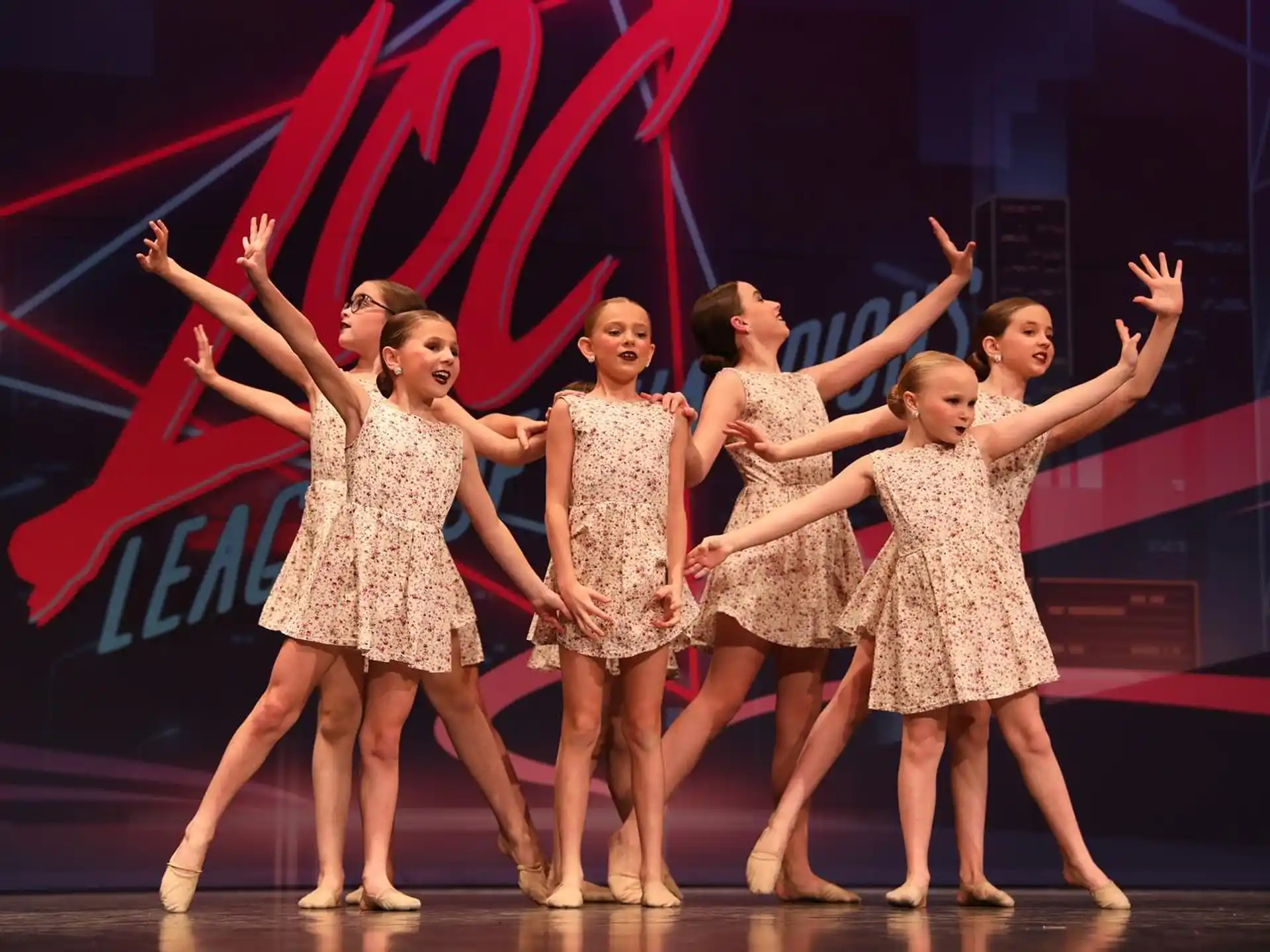 a group of women dancing on a stage