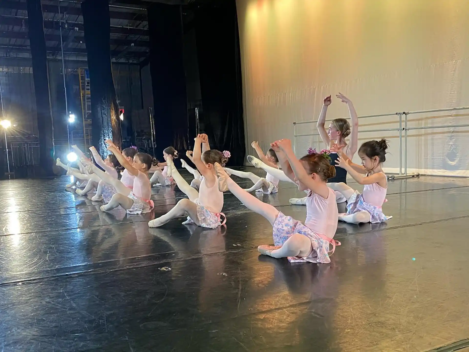 a group of girls on a stage