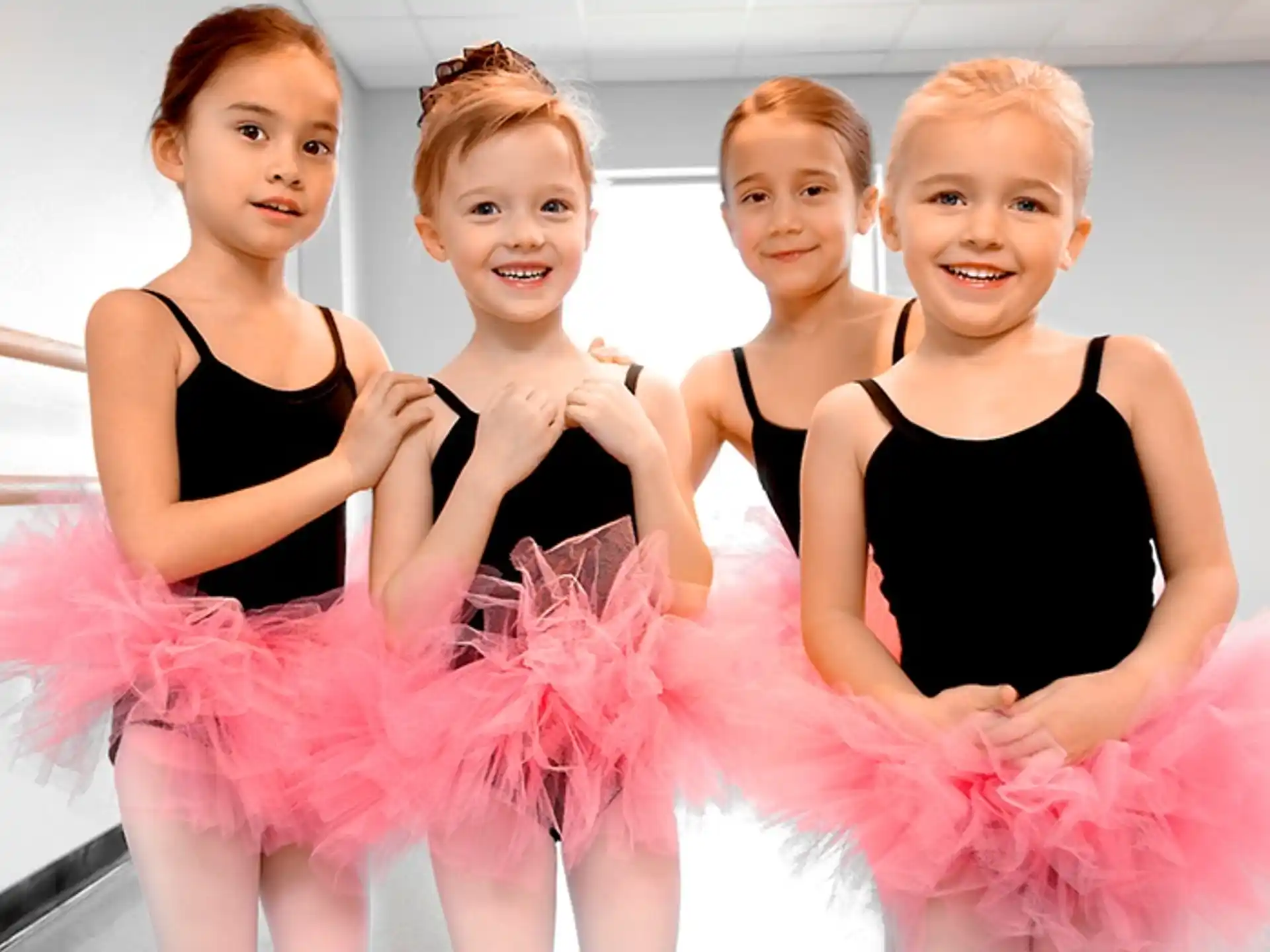 a group of girls in dresses