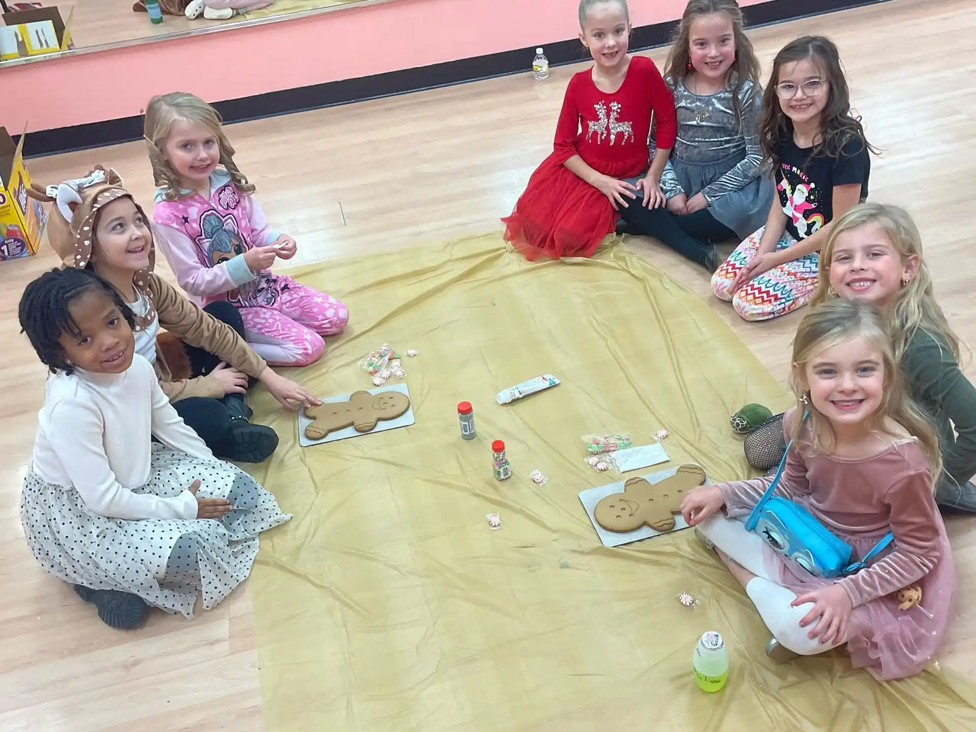 a group of children sitting on the floor