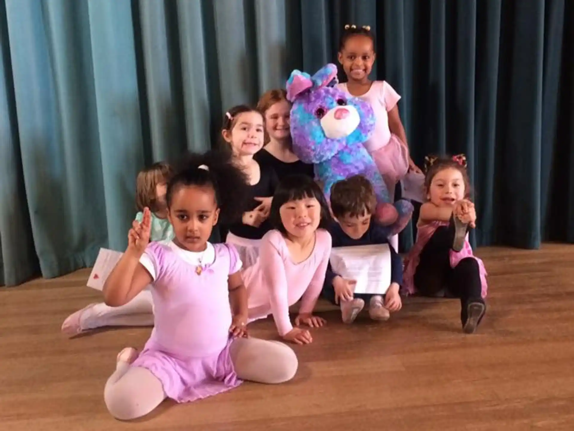 a group of children posing for a photo
