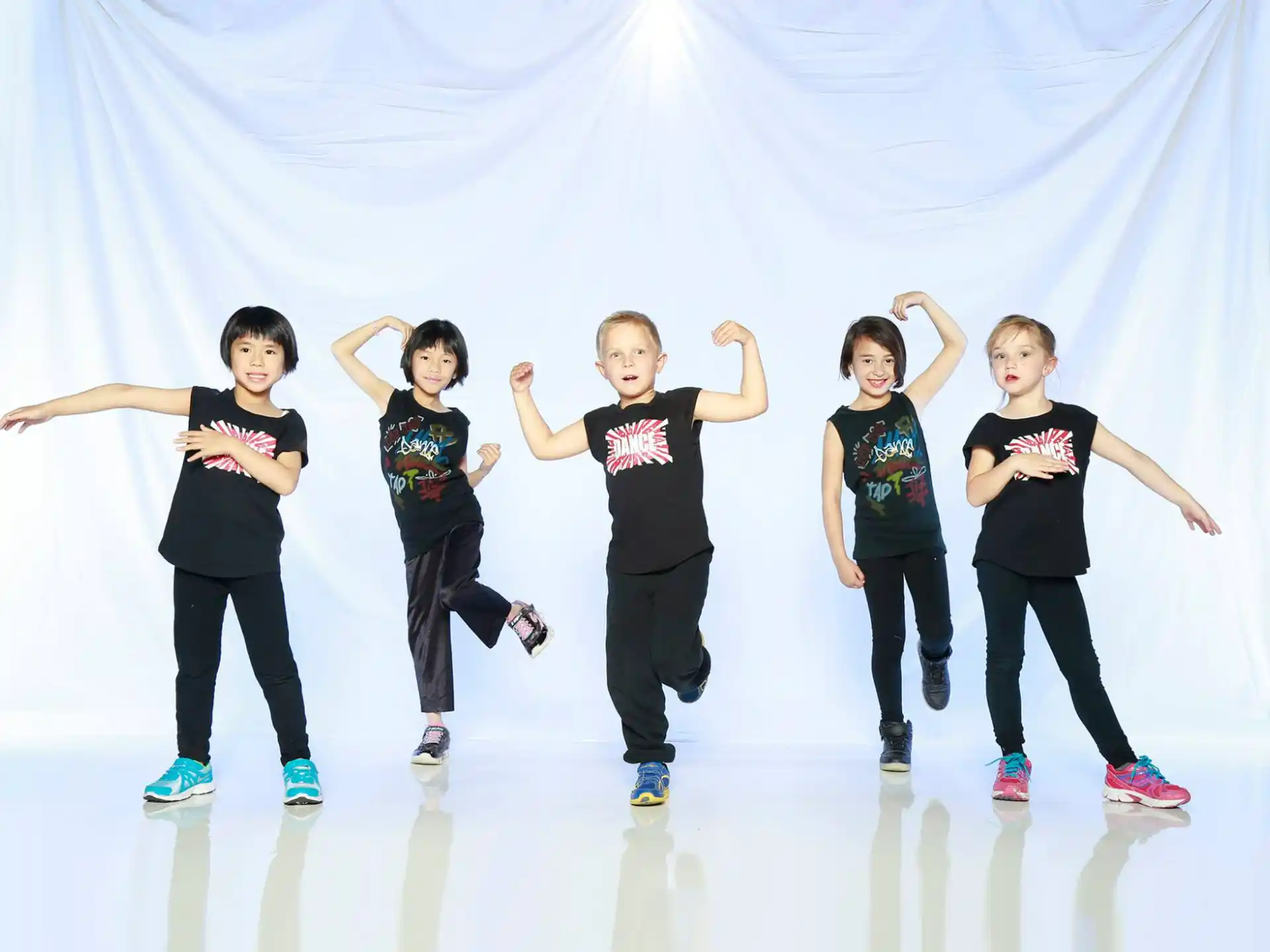 a group of kids posing for a picture