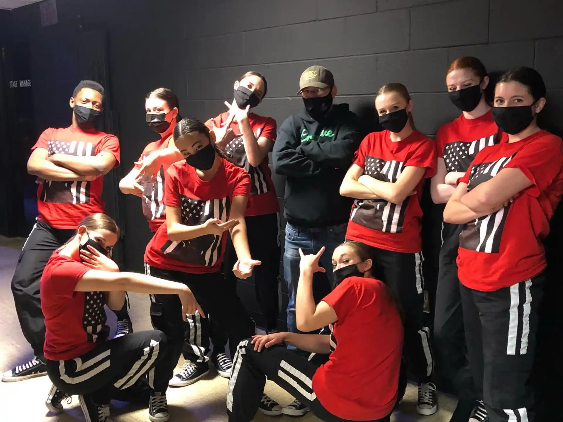 a group of people wearing masks