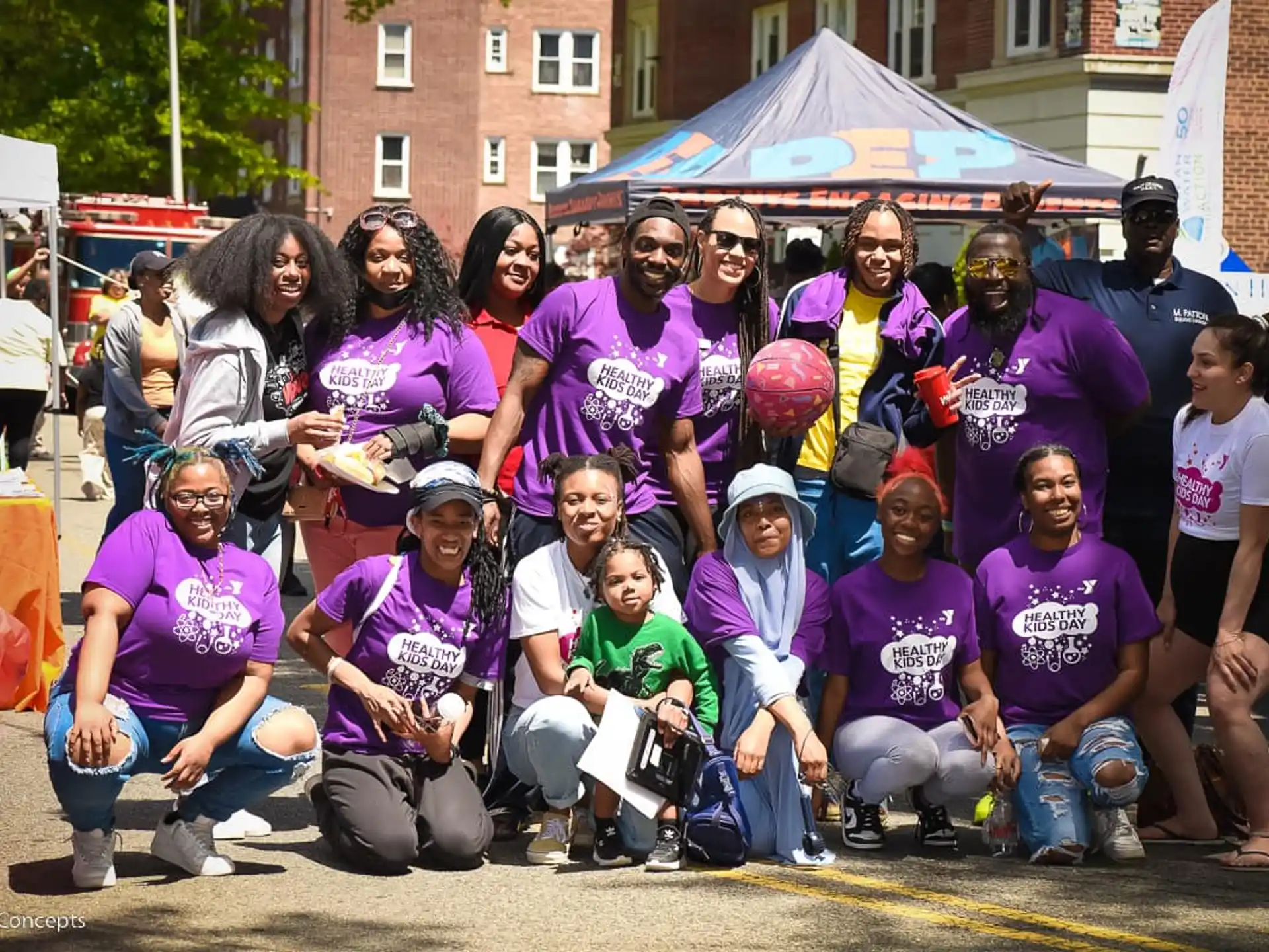 a group of people posing for a photo