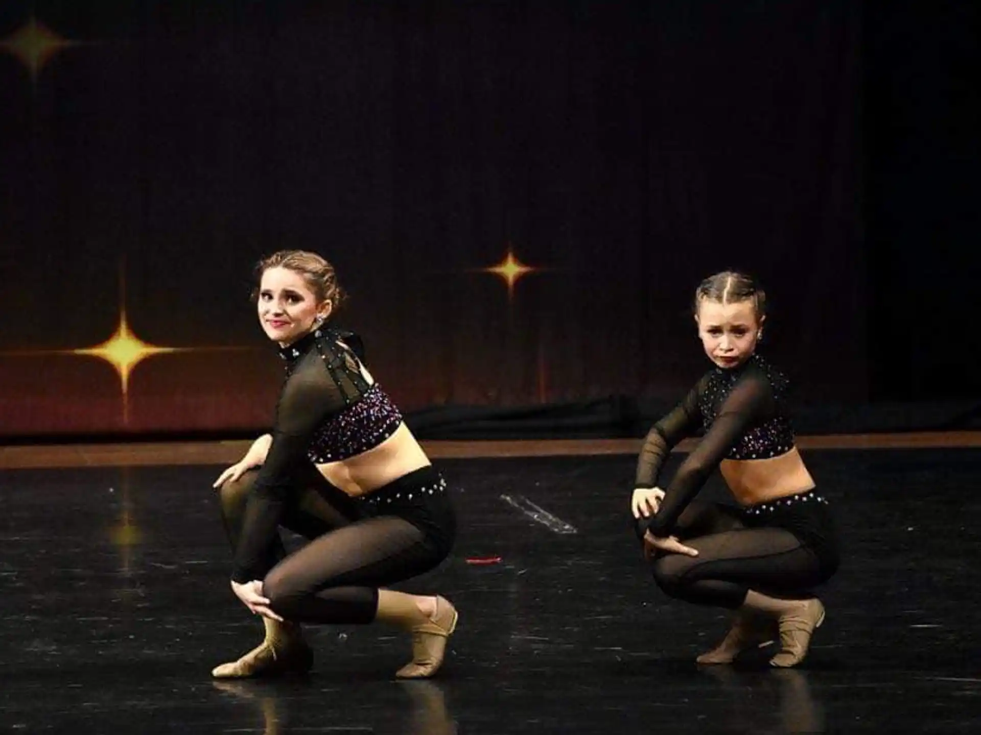 two women on a stage