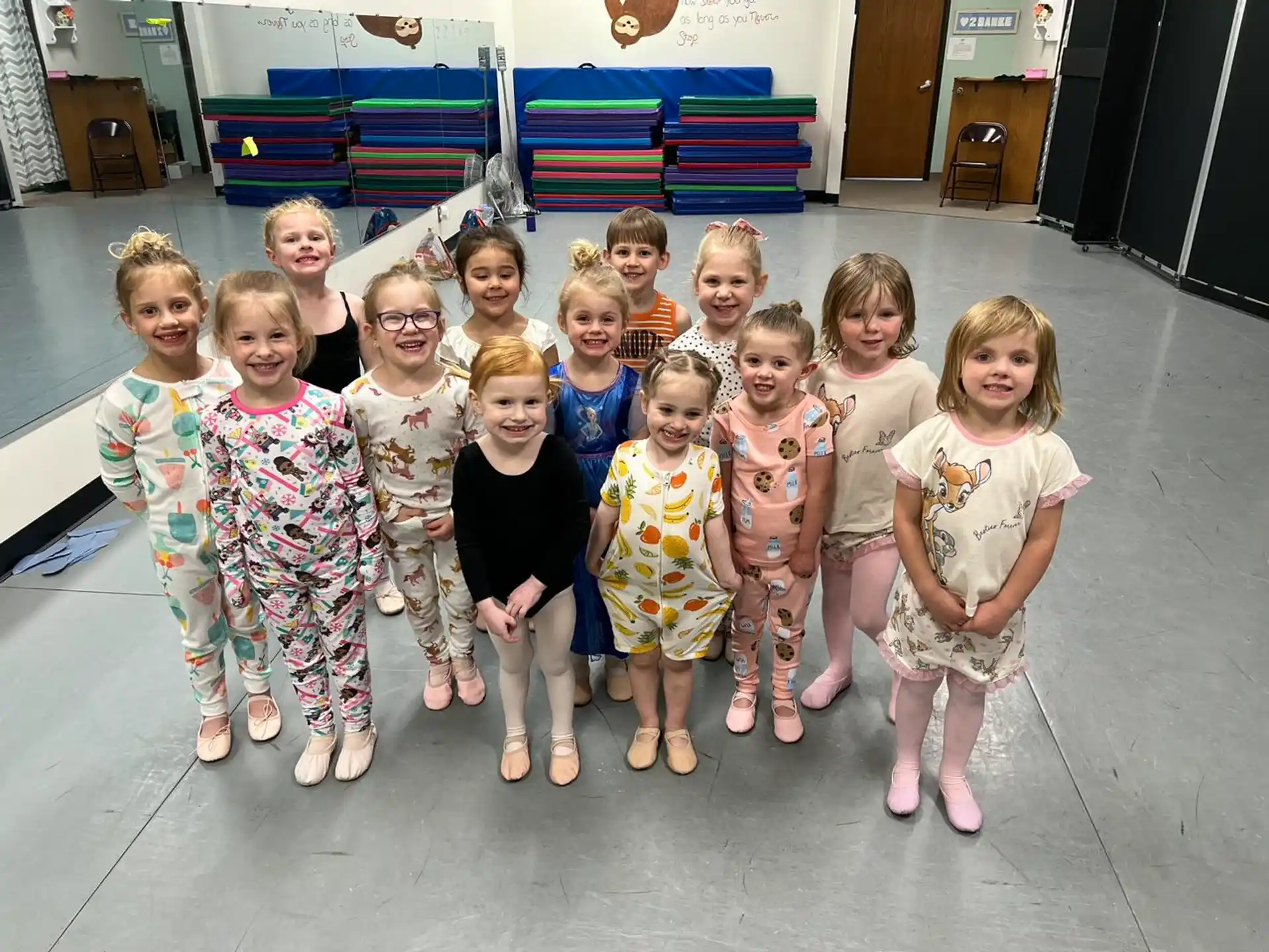 a group of children posing for a photo