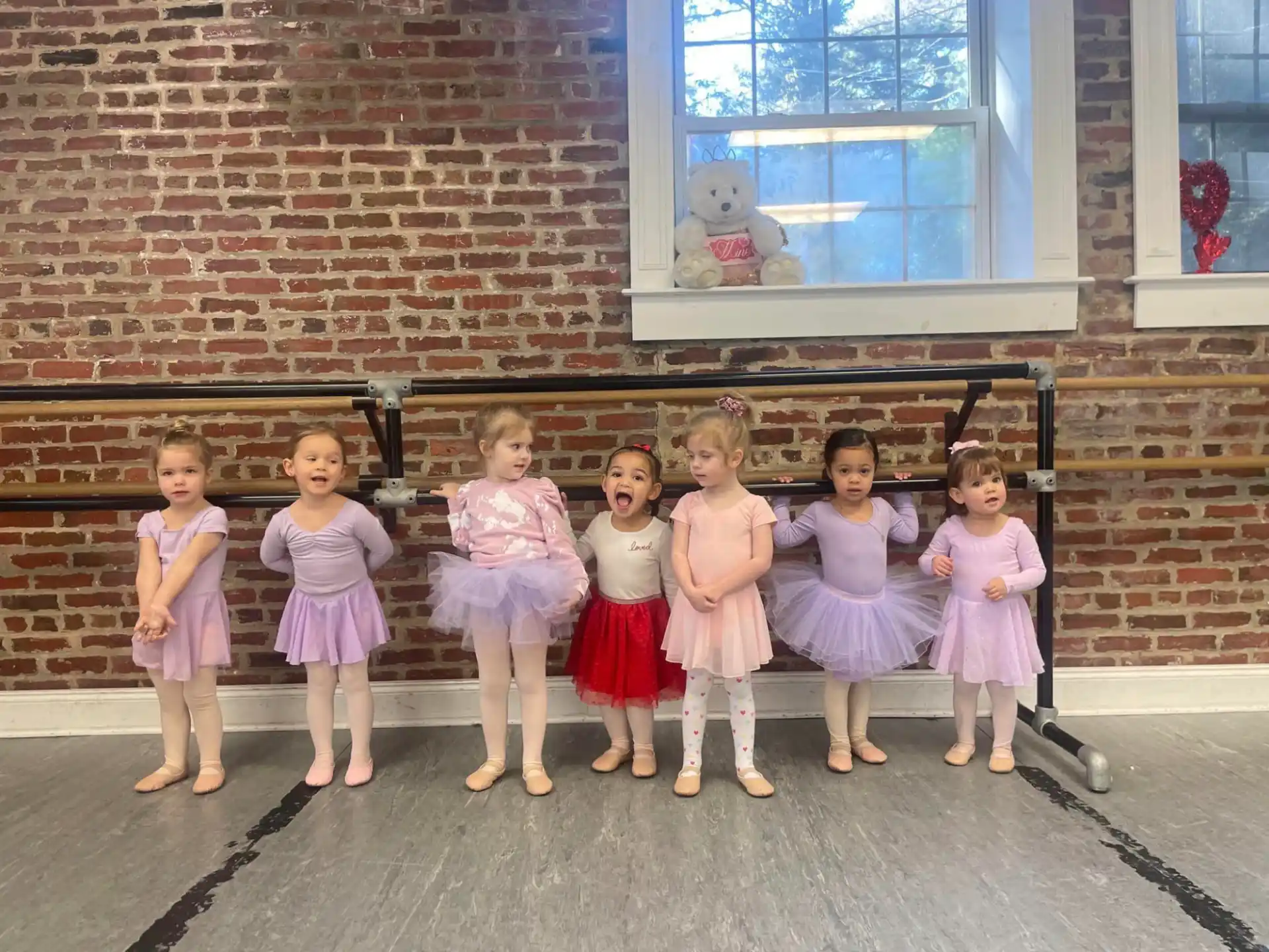 a group of children posing for a photo