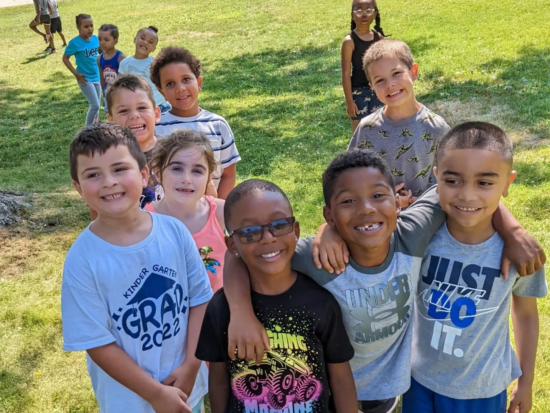 a group of children posing for a photo