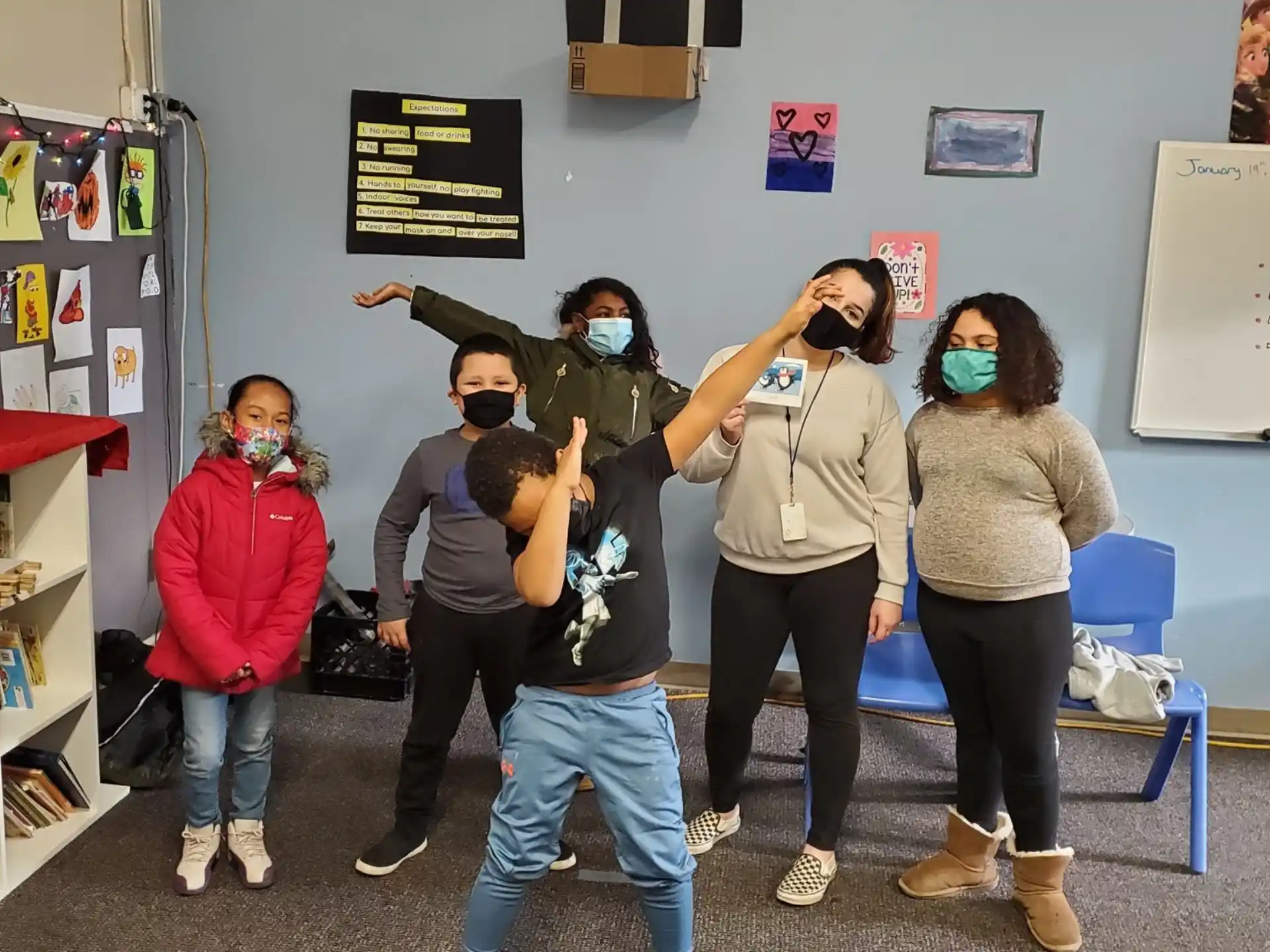 a group of people wearing masks