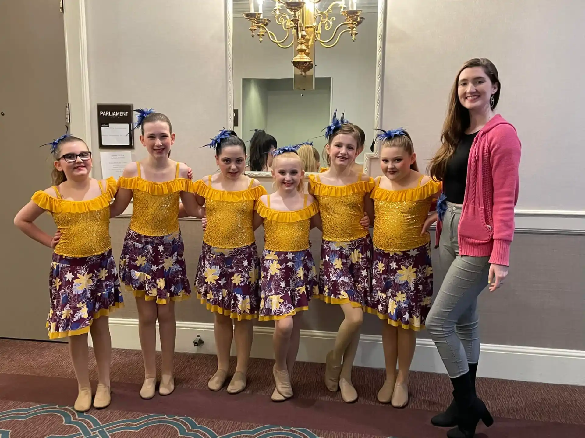 a group of girls posing for a photo