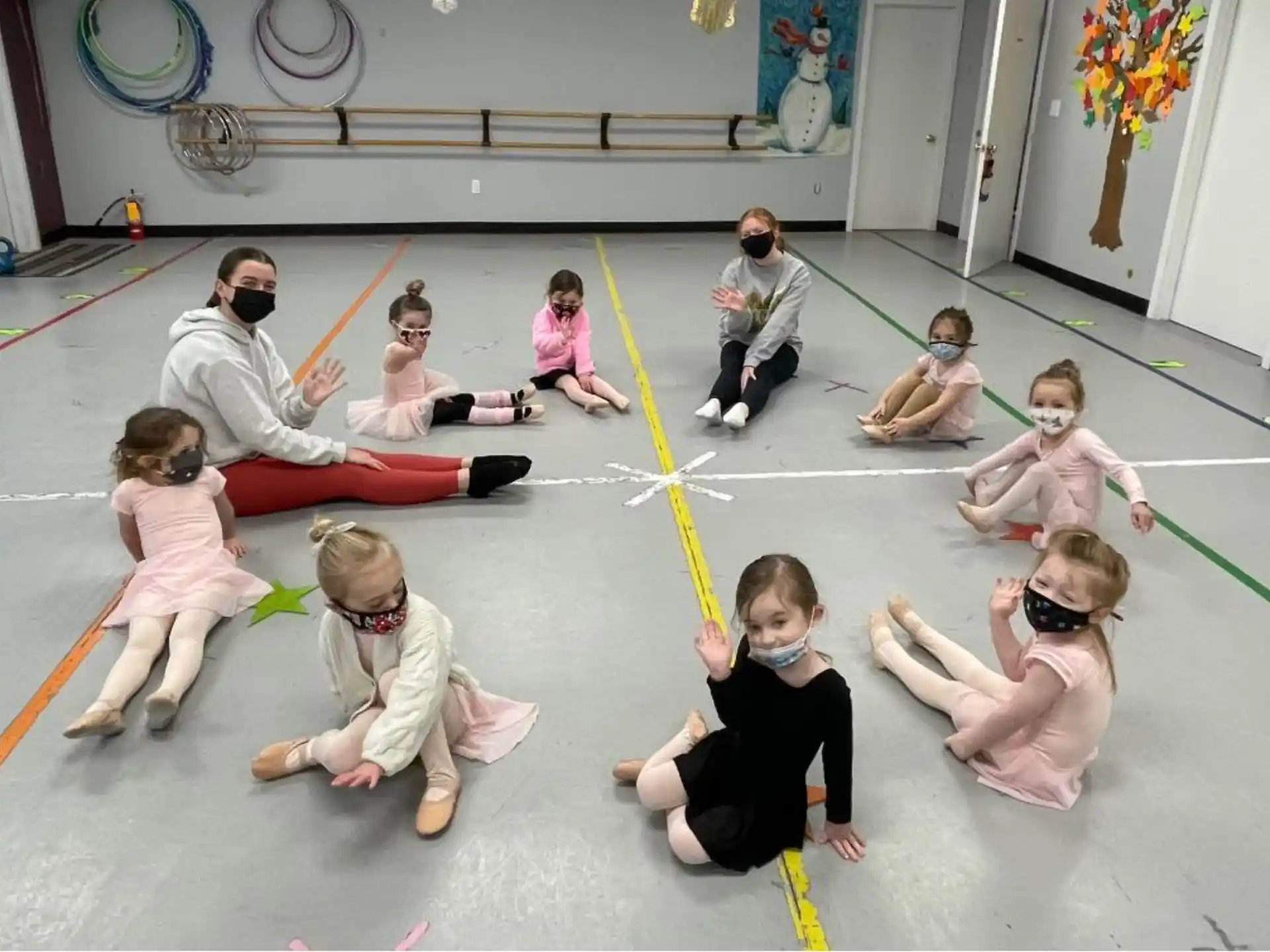 a group of people sitting on the floor