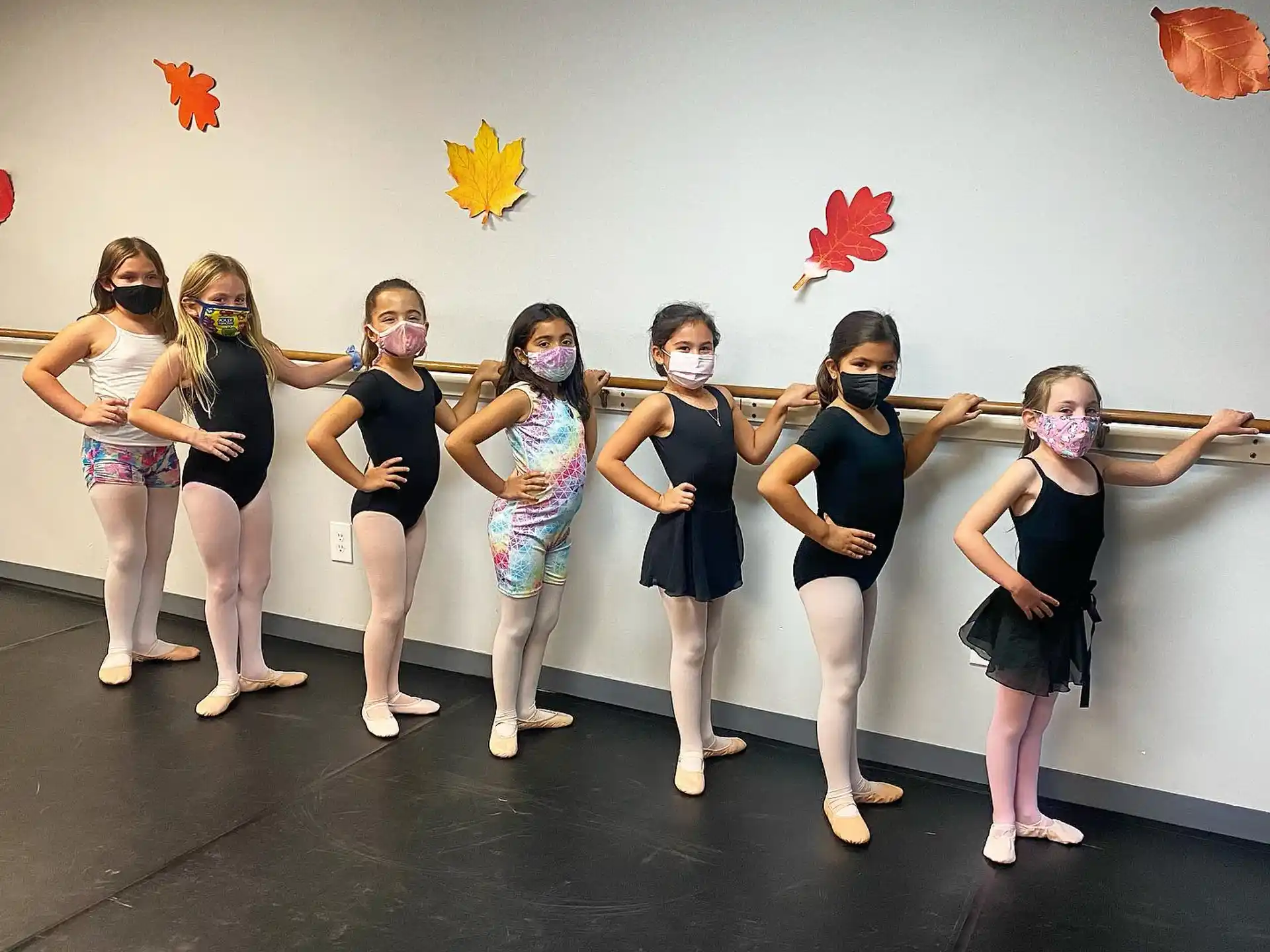 a group of girls posing for a picture