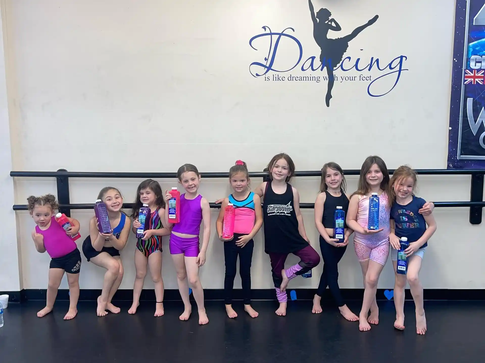 a group of girls posing for a photo
