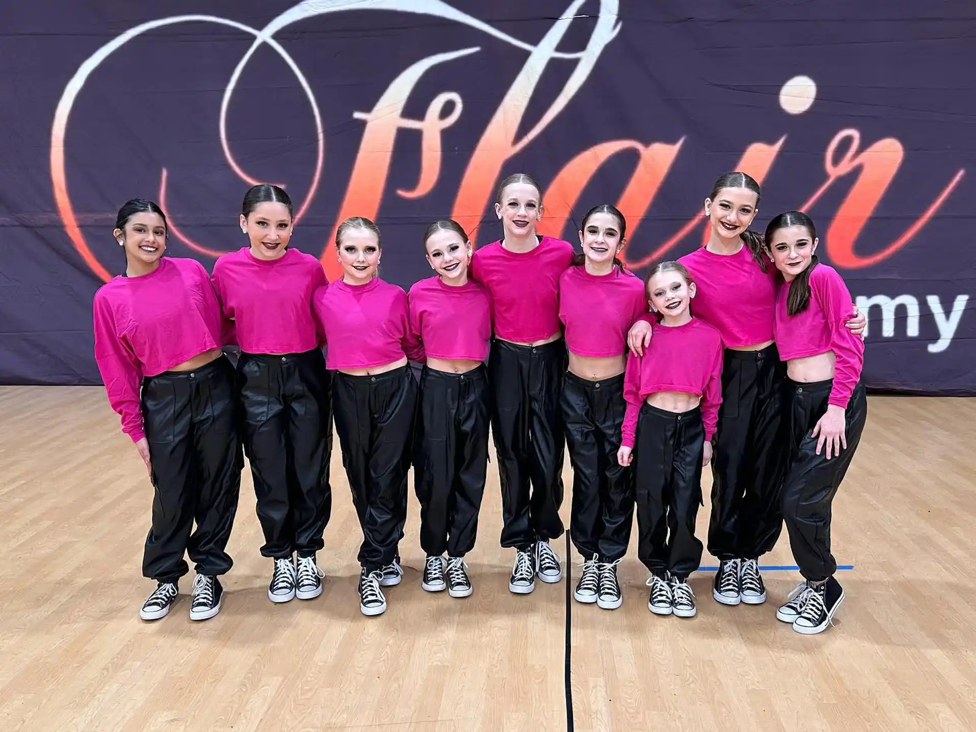 a group of people posing for a photo