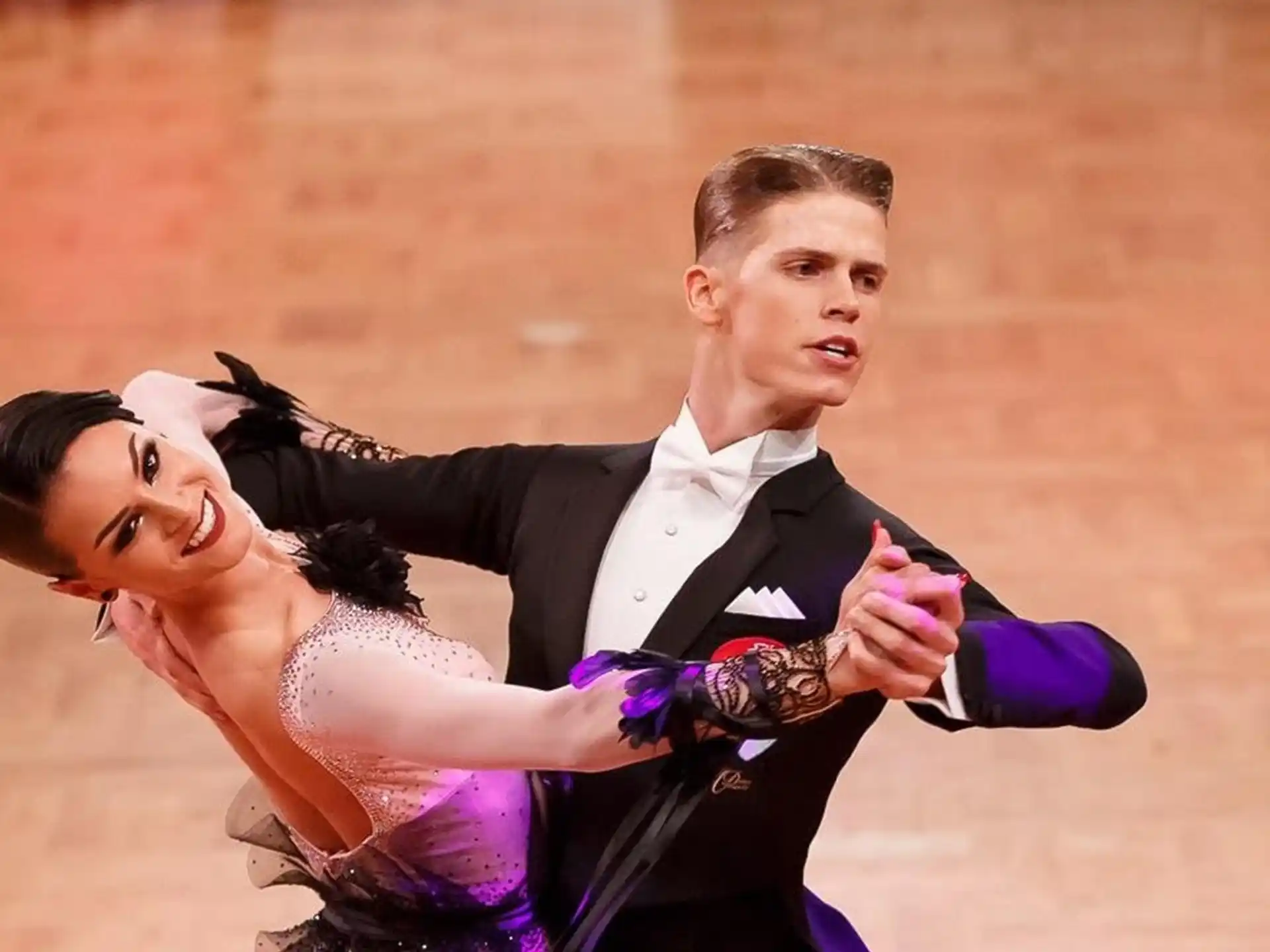 a man and woman dancing
