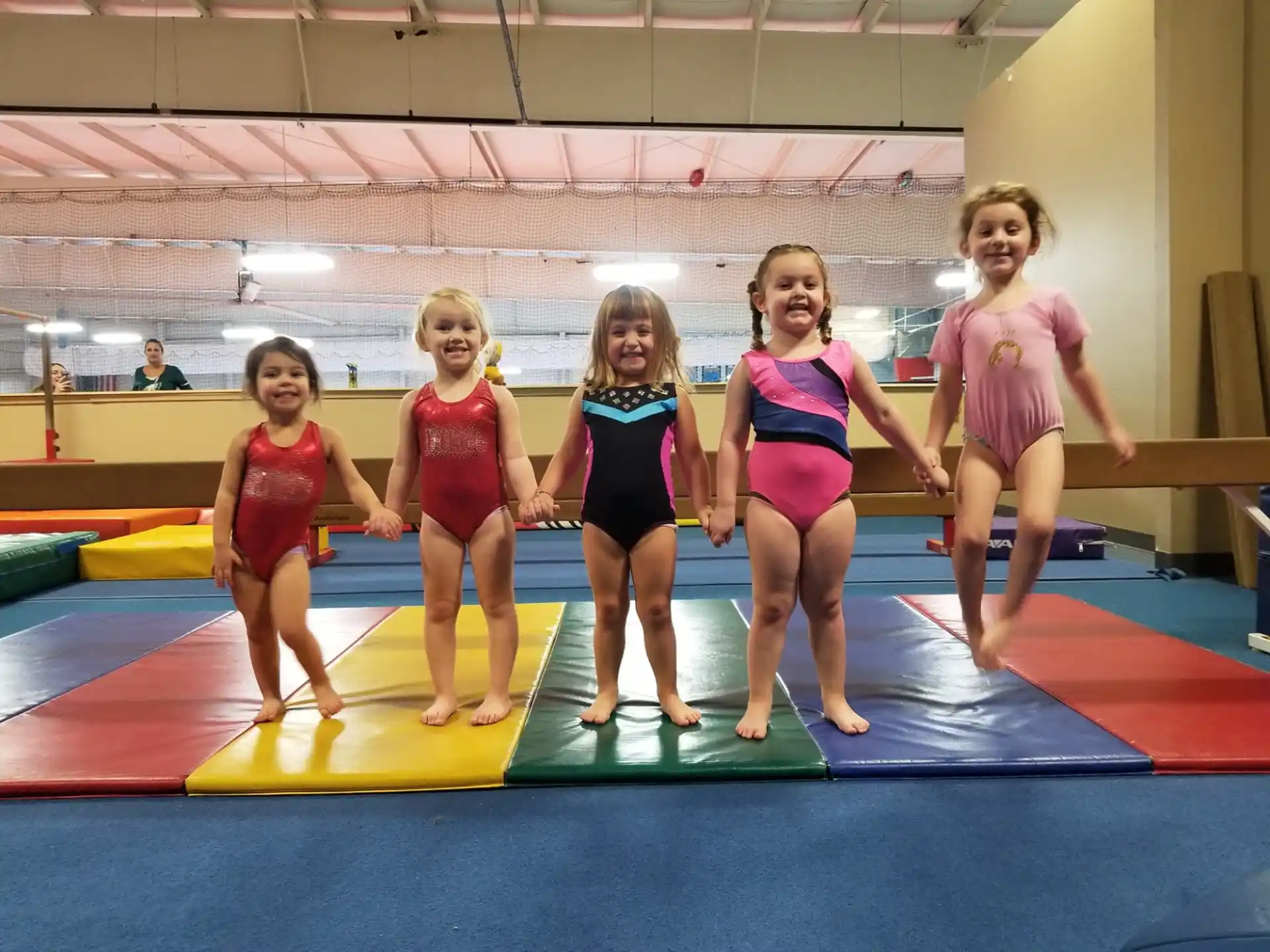 a group of girls posing for a photo