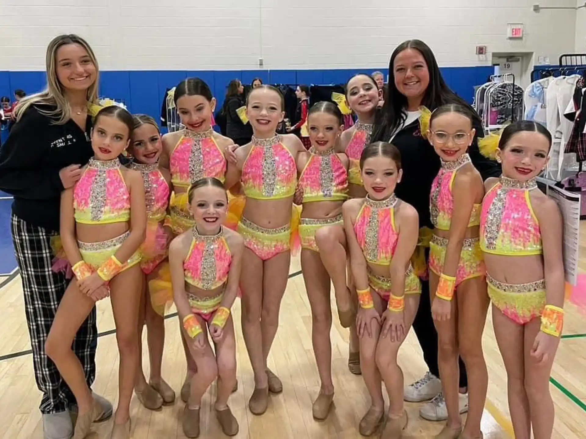 a group of girls posing for a photo