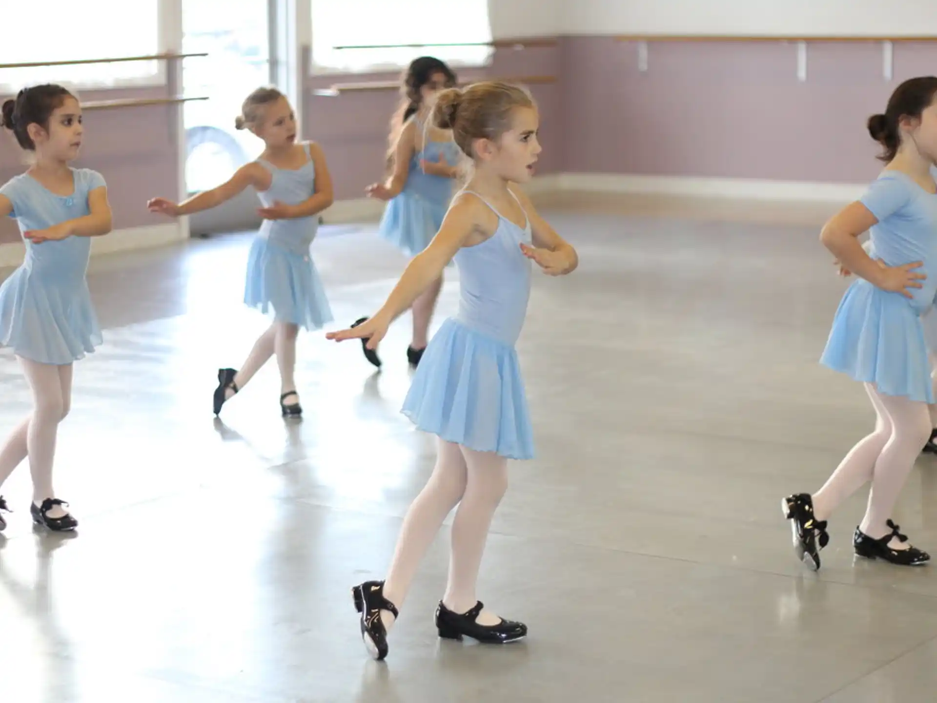 a group of girls dancing