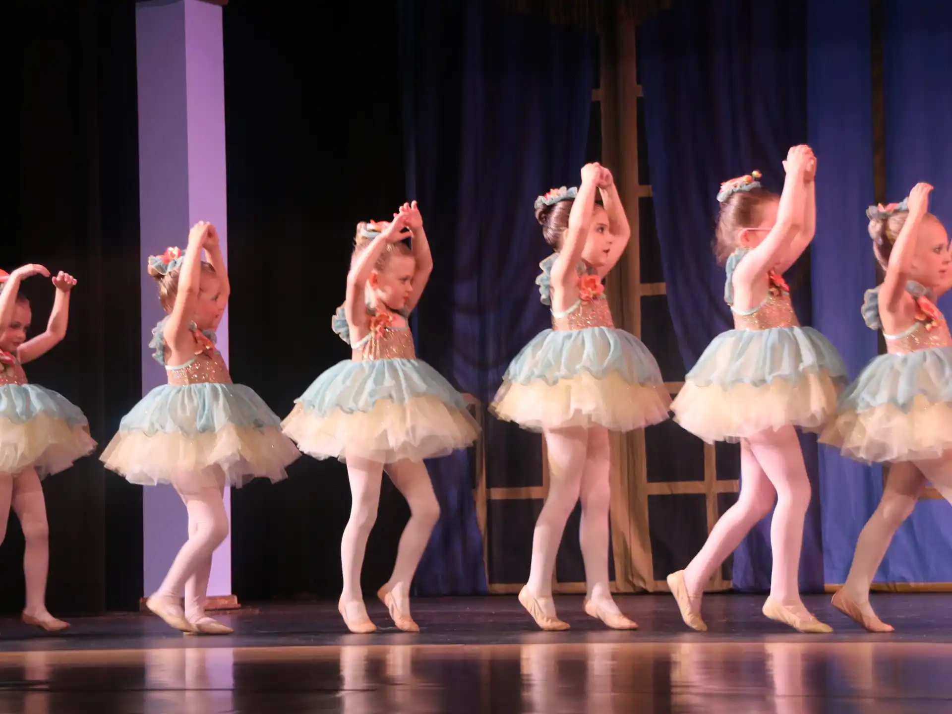 a group of girls in a performance