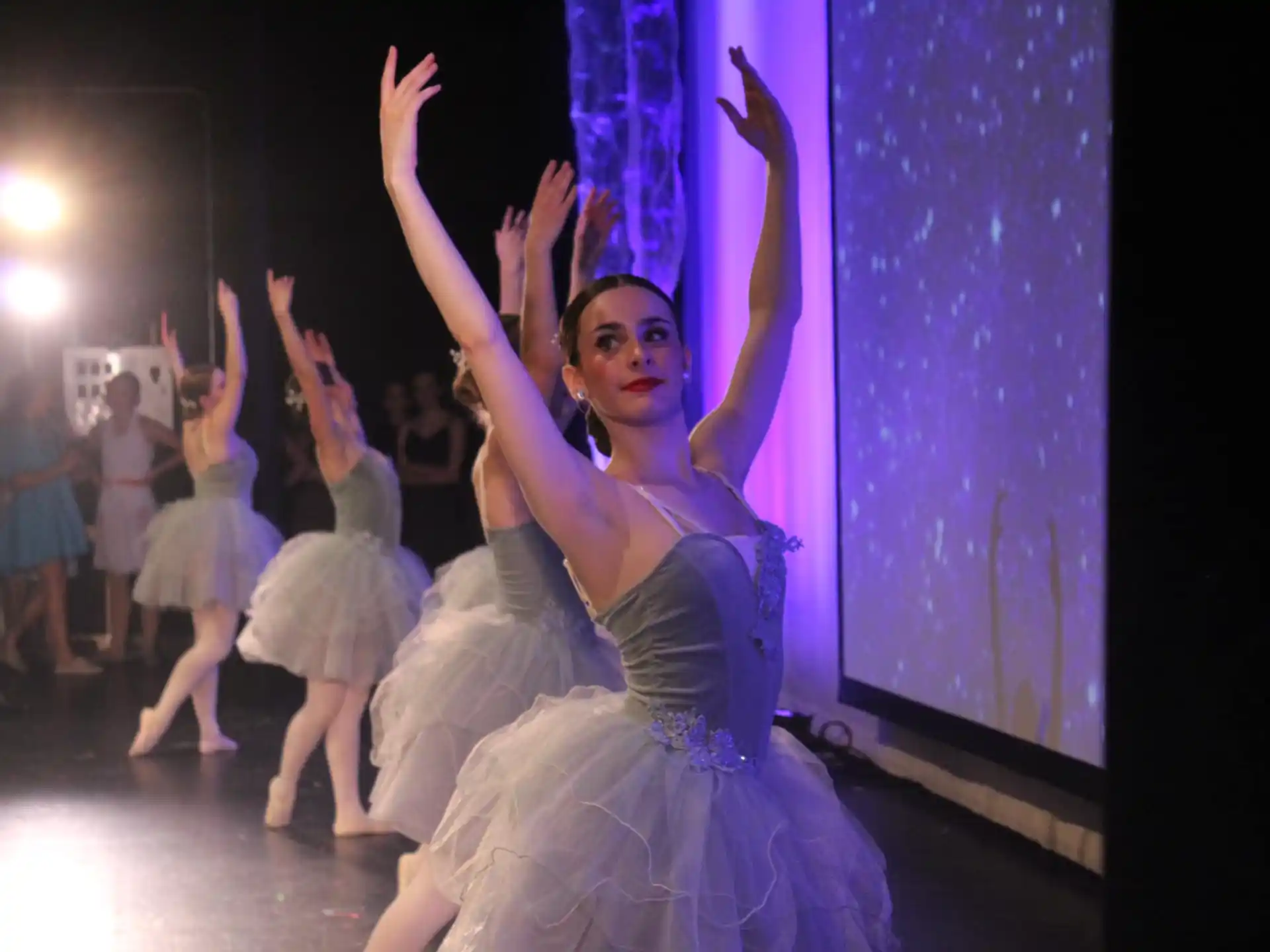 a woman in a dress dancing