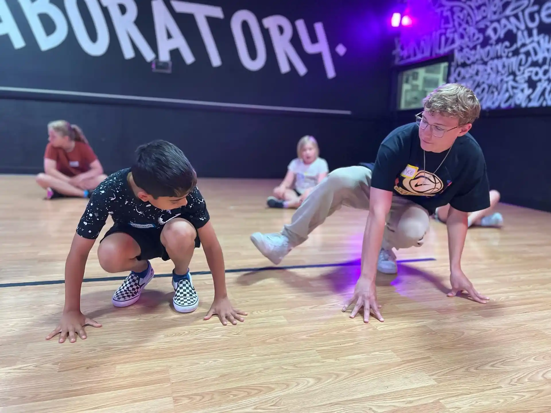 a group of people kneeling on the floor