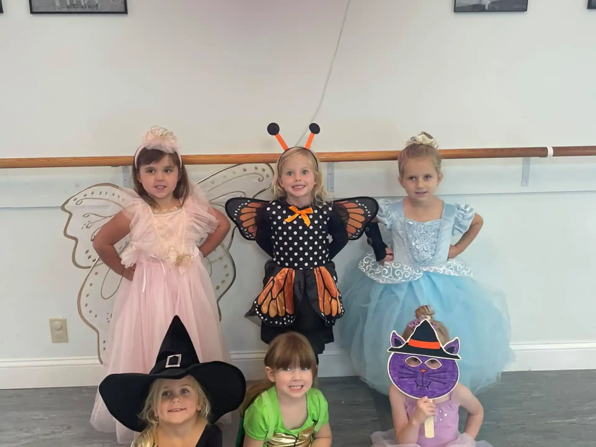 a group of children wearing clothing
