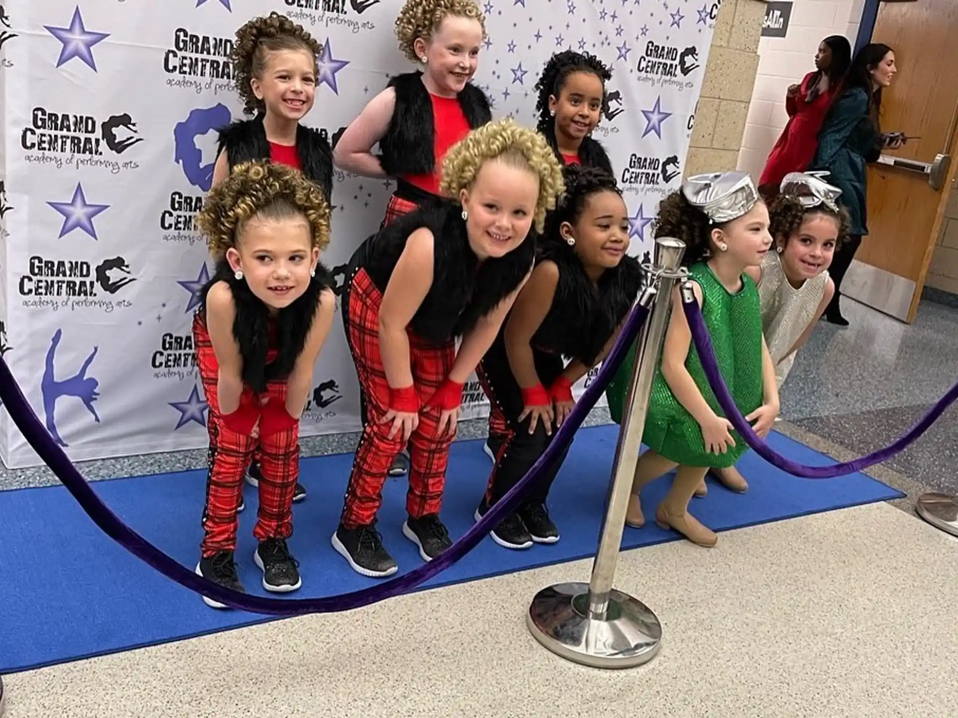 a group of children posing for a photo
