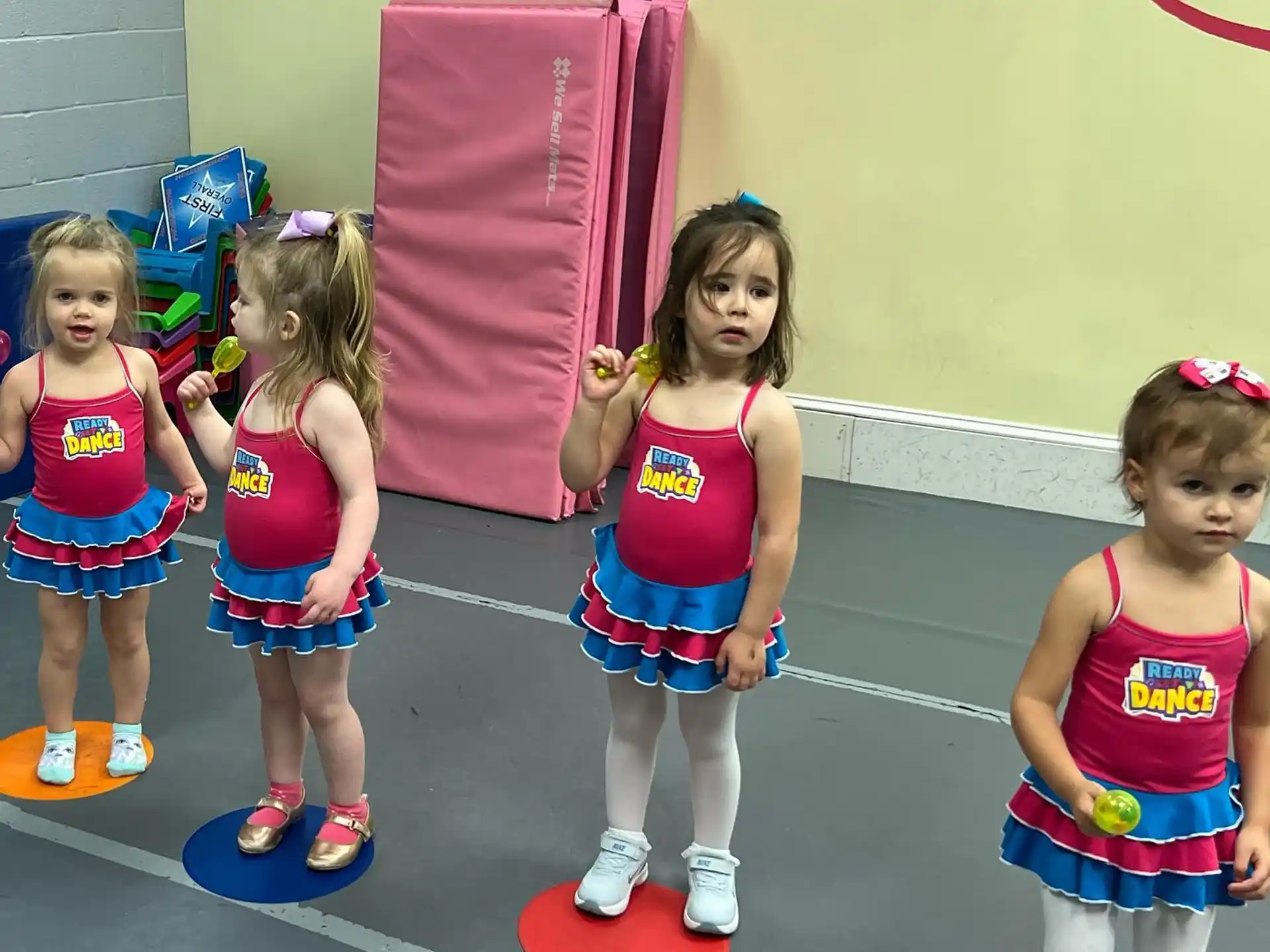 a group of girls in a gym