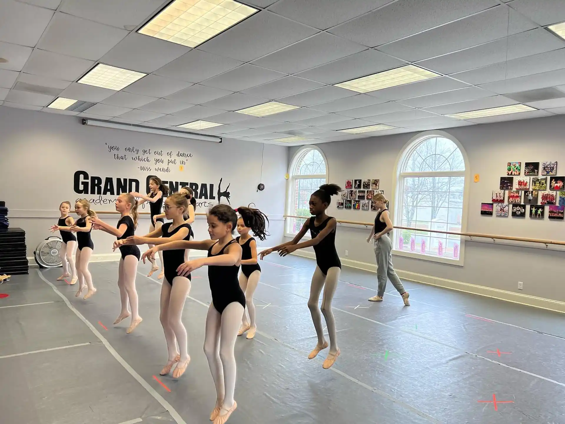 a group of women dancing in a room