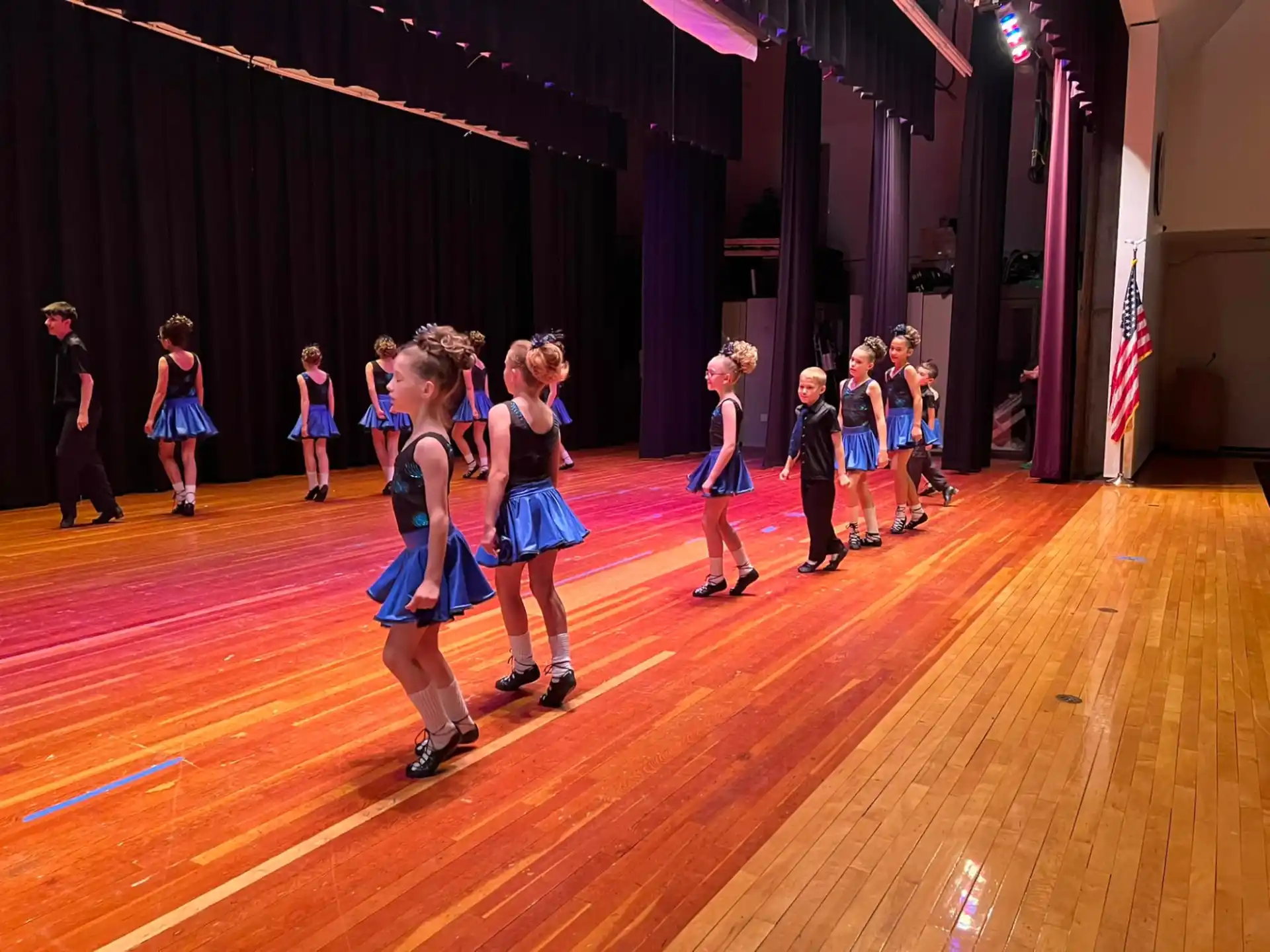 a group of children on a stage