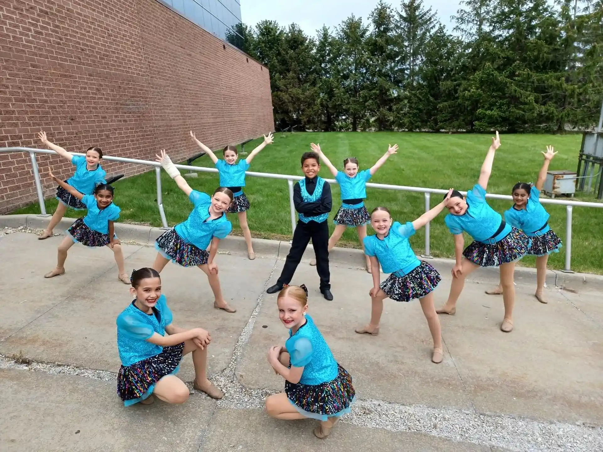 a group of girls posing for a photo