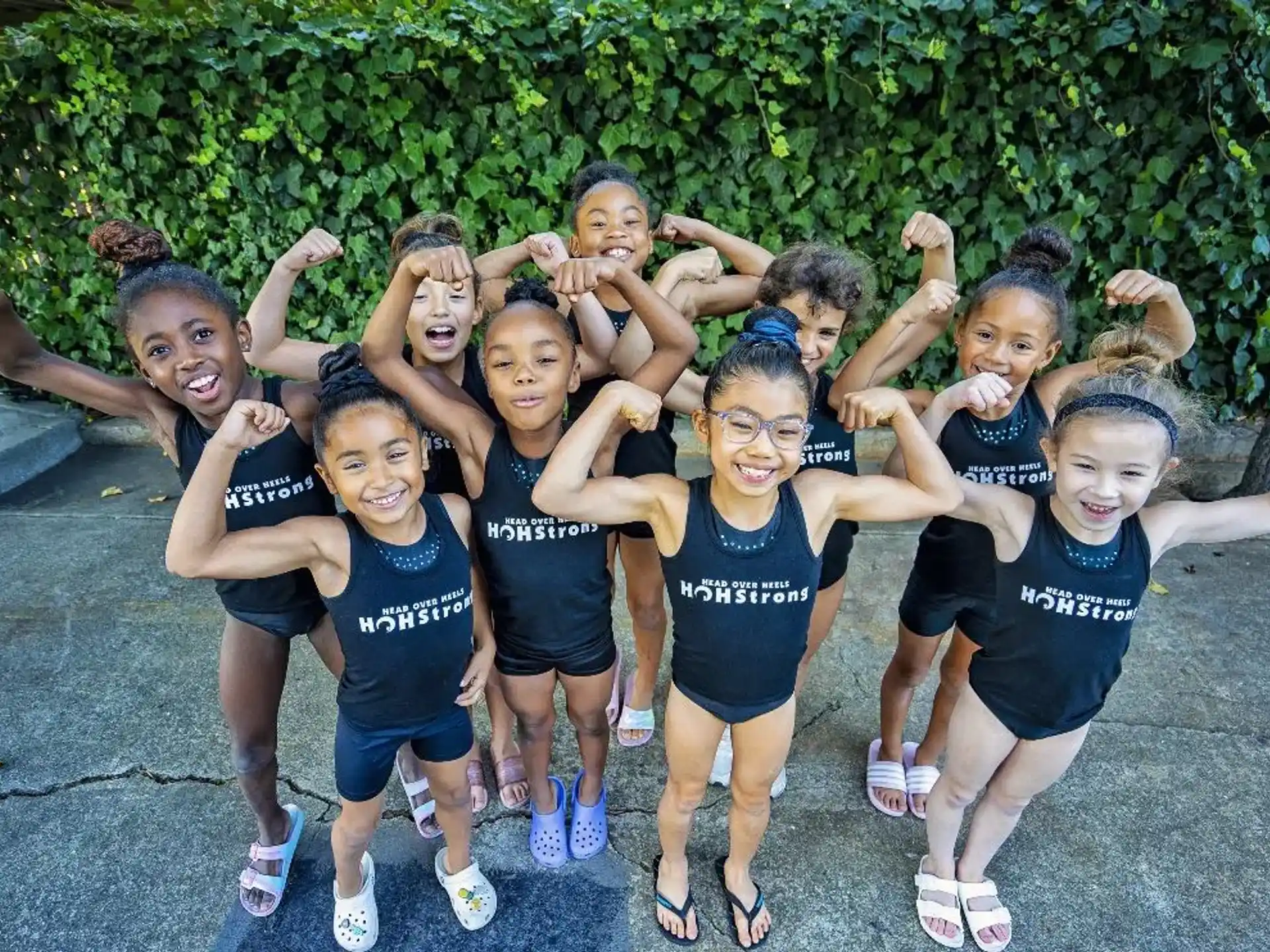 a group of girls posing for a photo
