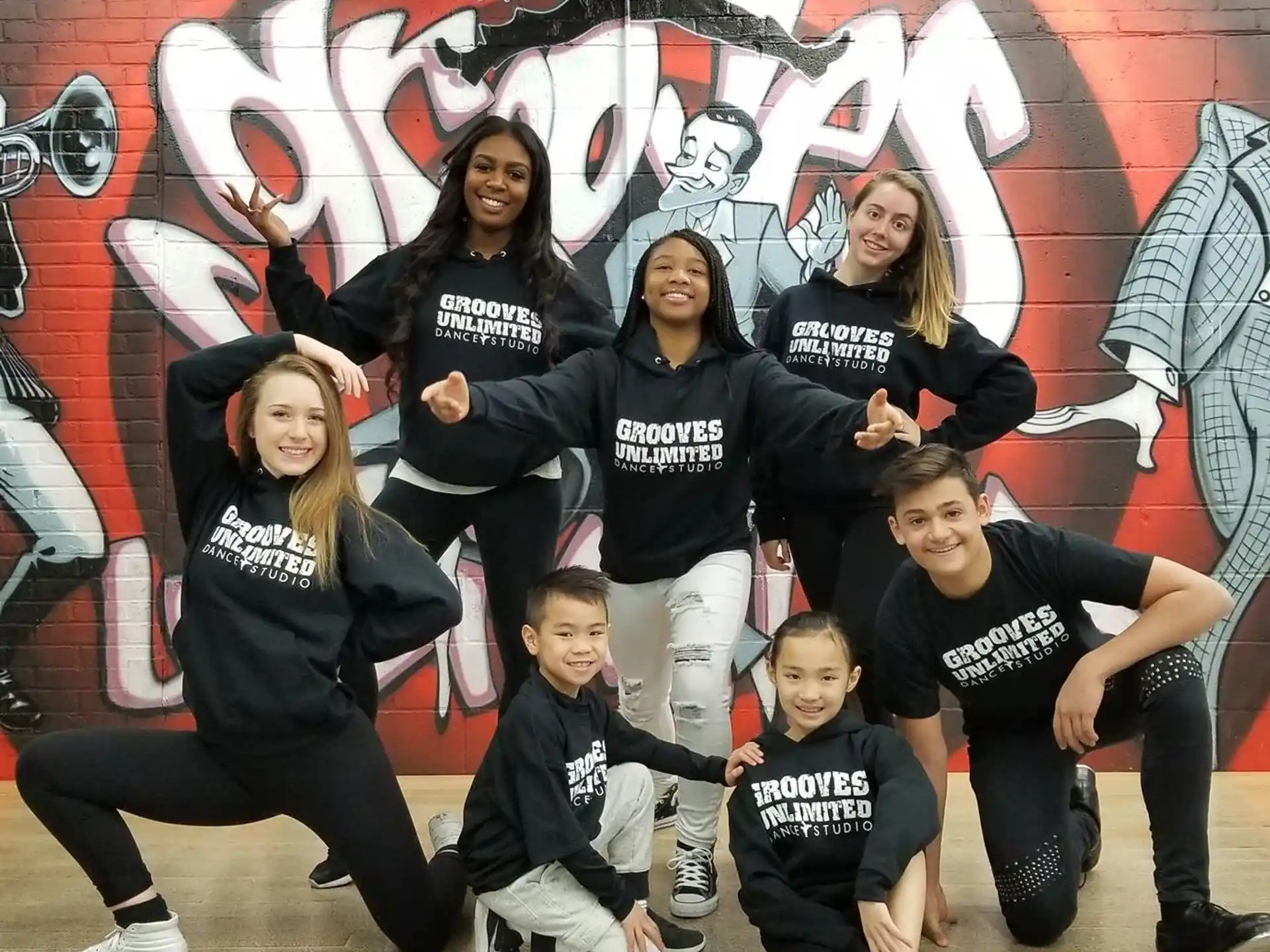 a group of people posing for a photo