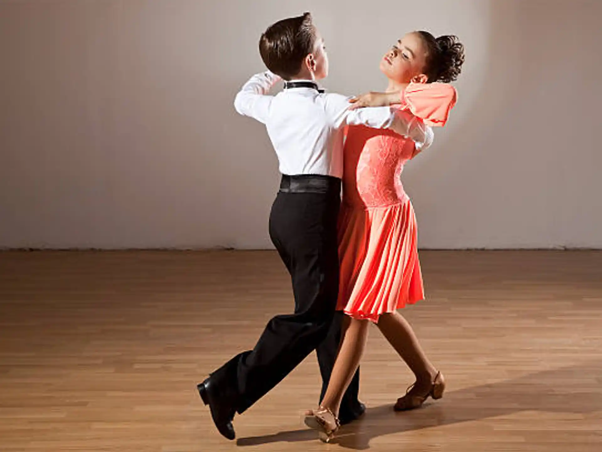 a man and woman dancing