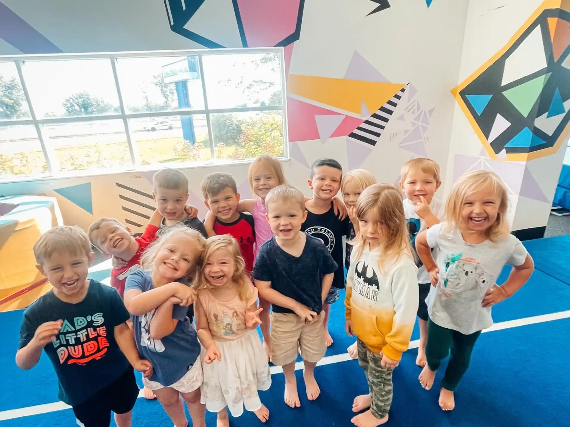 a group of children posing for a photo