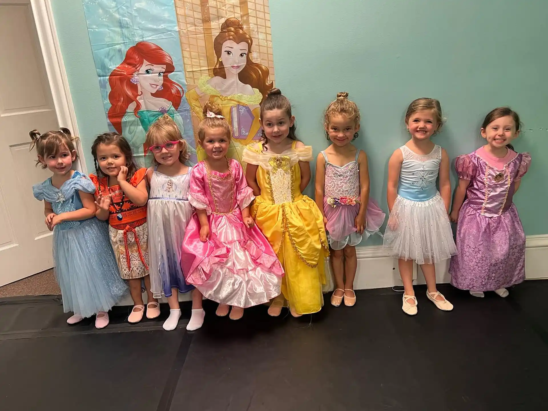 a group of children posing for a photo