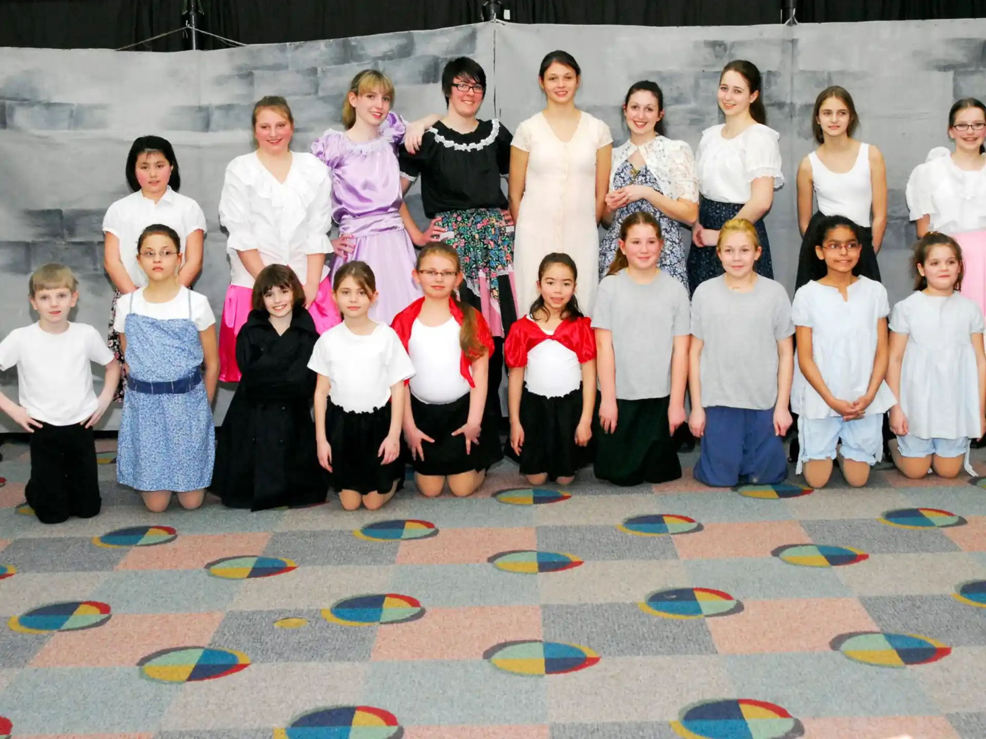 a group of children posing for a photo
