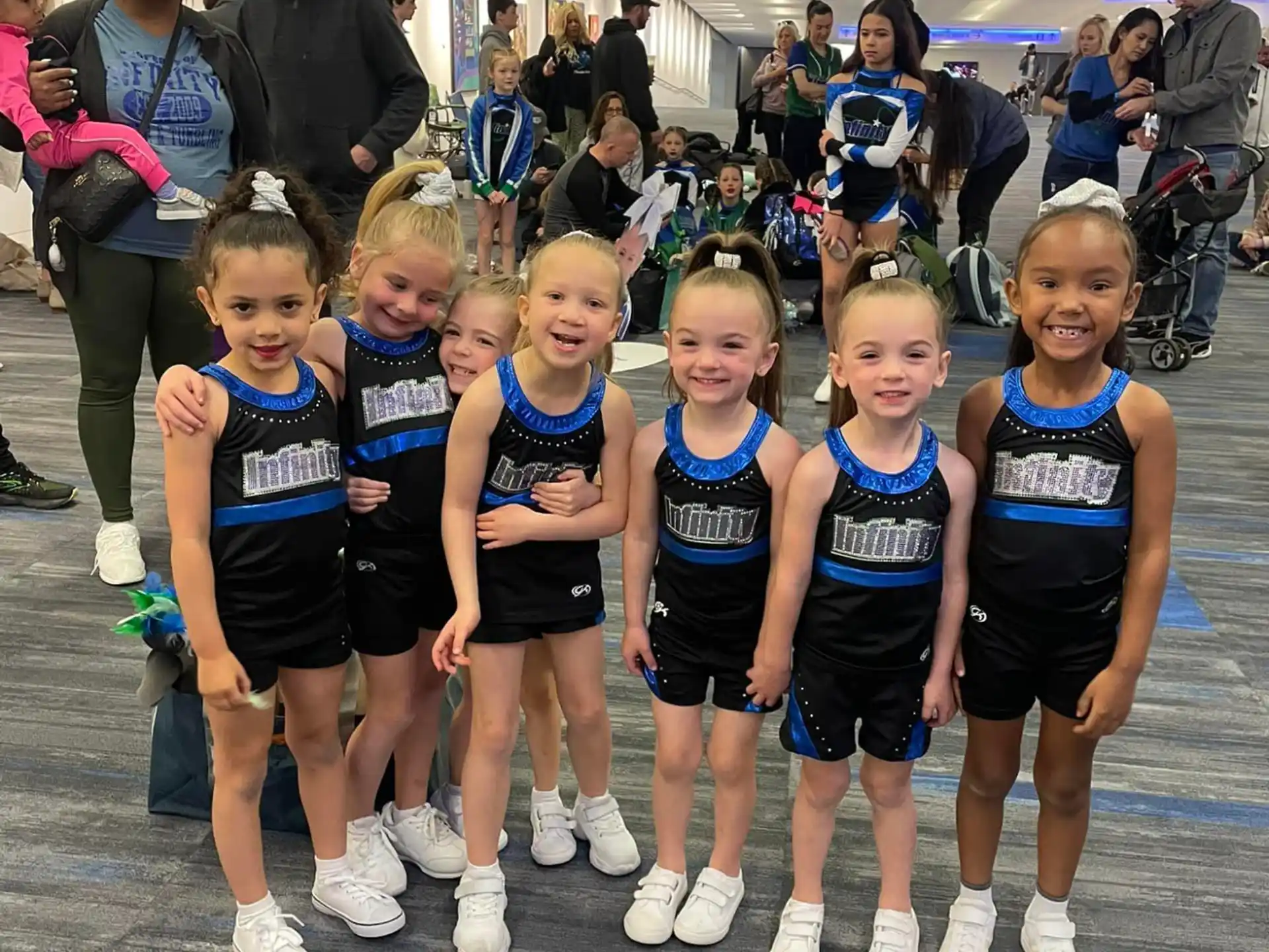 a group of girls in athletic wear